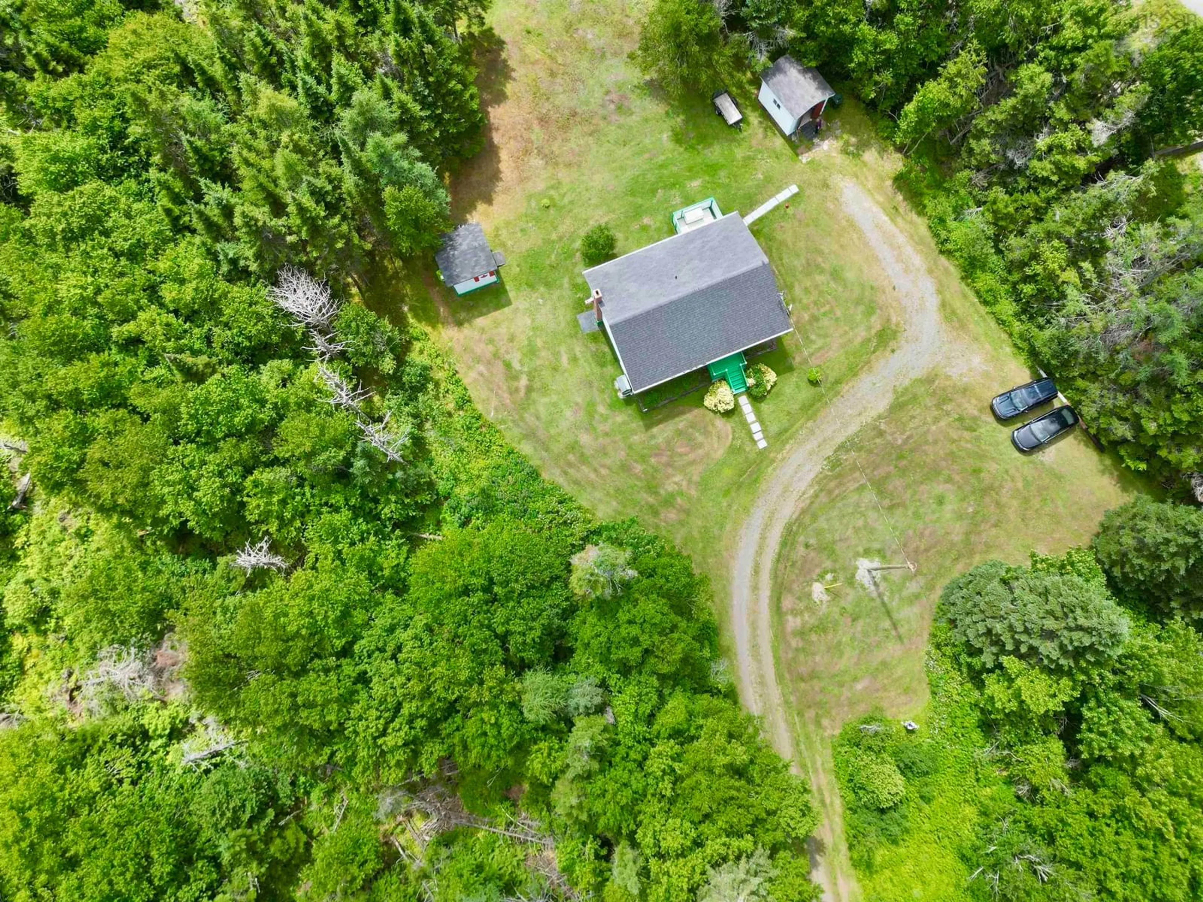 A pic from outside/outdoor area/front of a property/back of a property/a pic from drone, forest/trees view for 6954 Highway 327, French Road Nova Scotia B1K 2A6