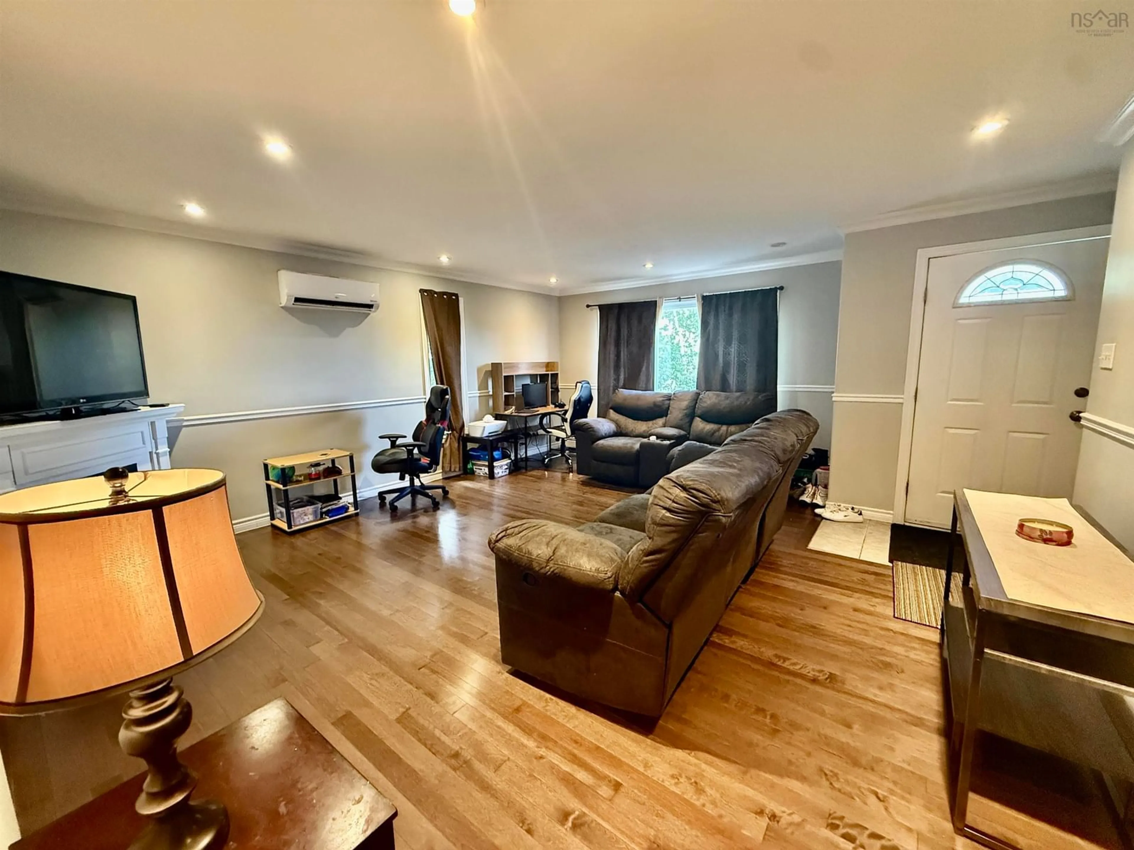 Living room with furniture, wood/laminate floor for 6 Beacon St, Dartmouth Nova Scotia B2Y 1Y2