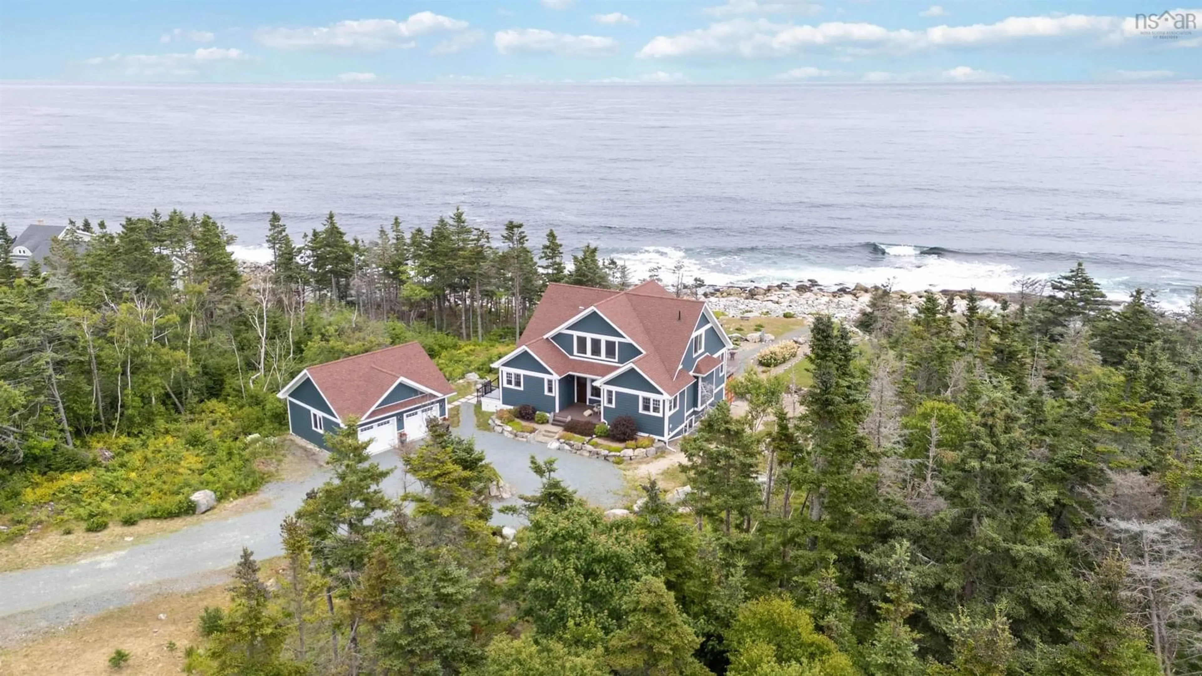 A pic from outside/outdoor area/front of a property/back of a property/a pic from drone, water/lake/river/ocean view for 170 Edgewater Dr, White Point Nova Scotia B0T 1G0