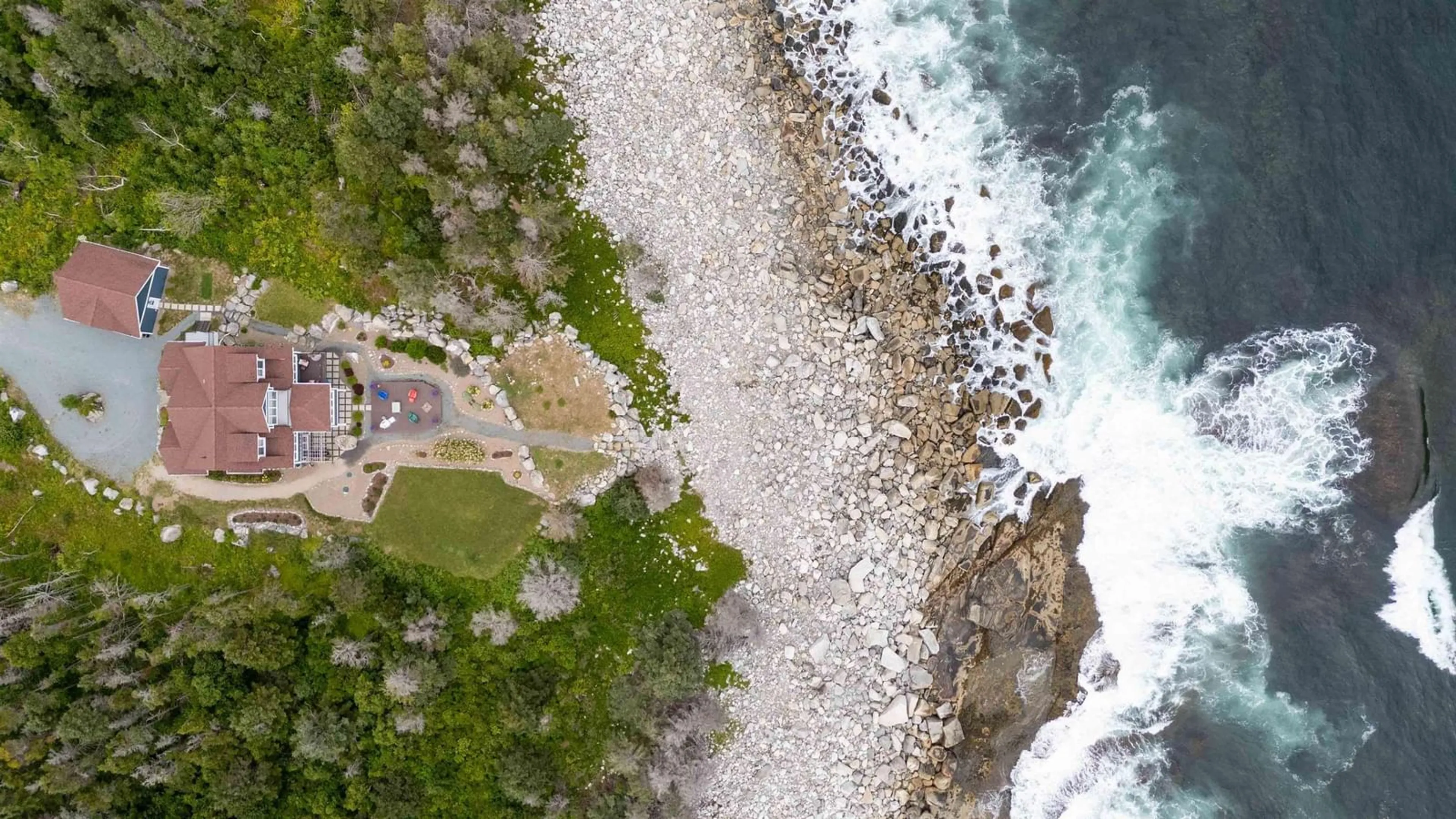 A pic from outside/outdoor area/front of a property/back of a property/a pic from drone, water/lake/river/ocean view for 170 Edgewater Dr, White Point Nova Scotia B0T 1G0
