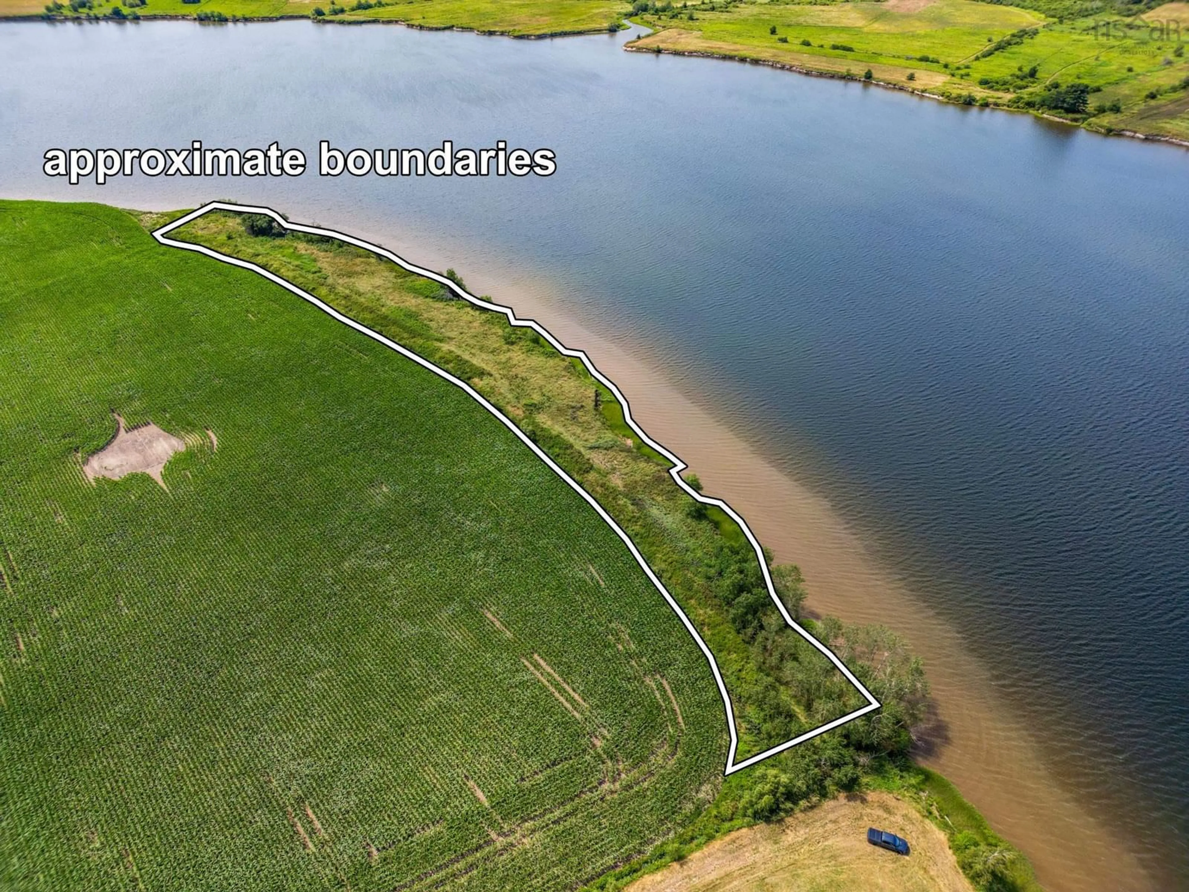 A pic from outside/outdoor area/front of a property/back of a property/a pic from drone, water/lake/river/ocean view for 1588 Highway 201, Round Hill Nova Scotia B0S 1A0