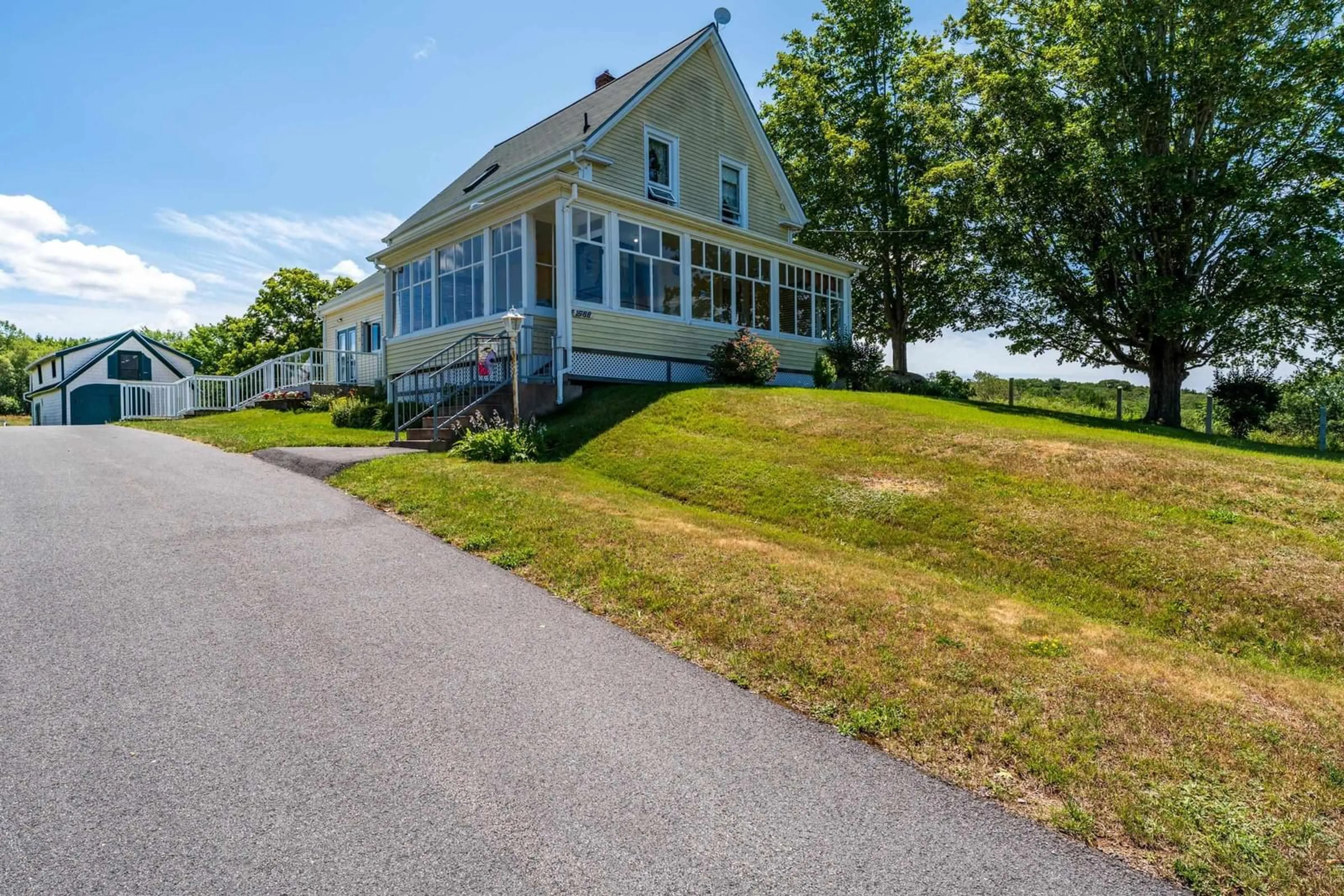 A pic from outside/outdoor area/front of a property/back of a property/a pic from drone, water/lake/river/ocean view for 1588 Highway 201, Round Hill Nova Scotia B0S 1A0