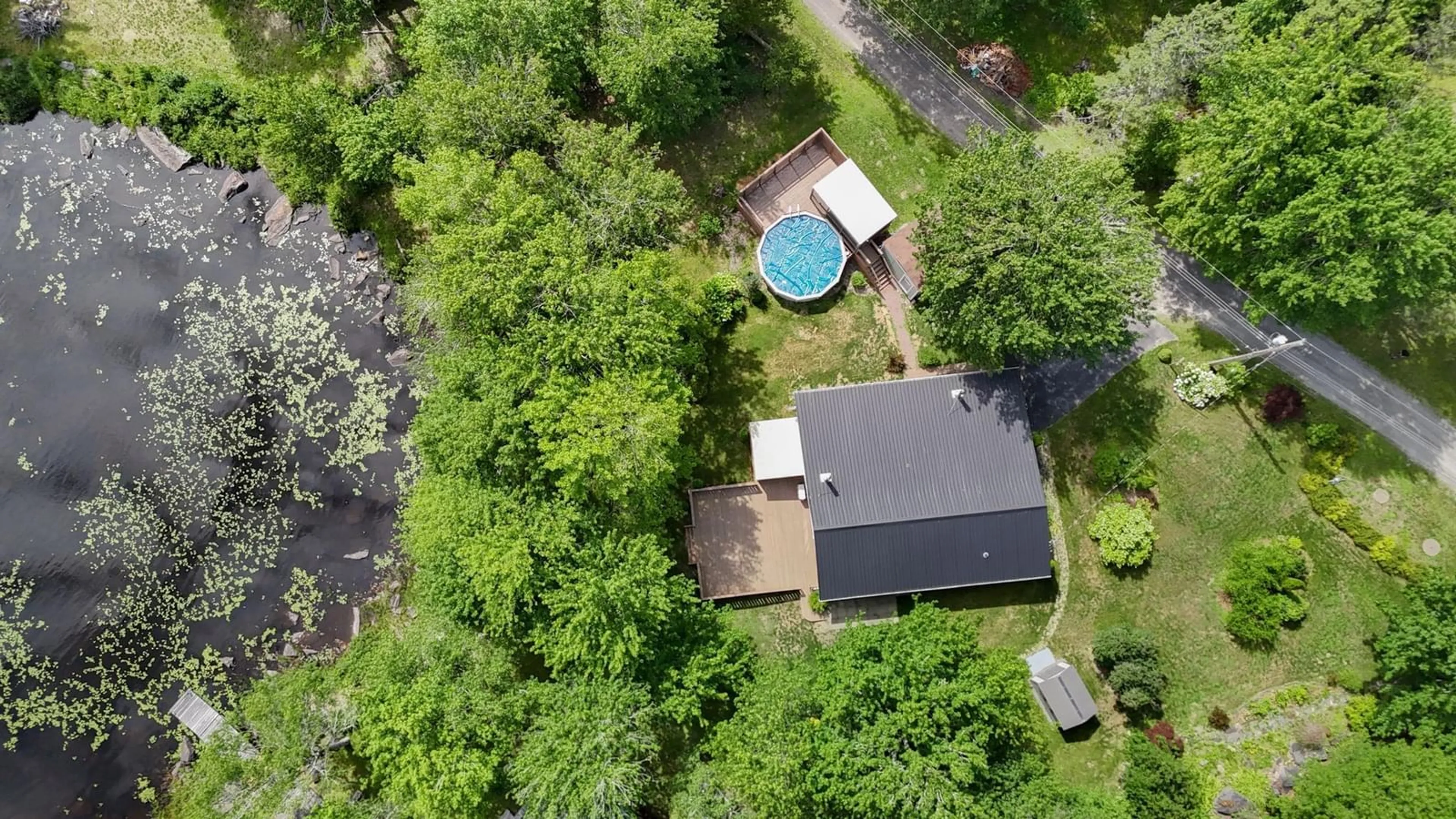 A pic from outside/outdoor area/front of a property/back of a property/a pic from drone, forest/trees view for 21 Lakeview Rd, Hemford Nova Scotia B0R 1E0