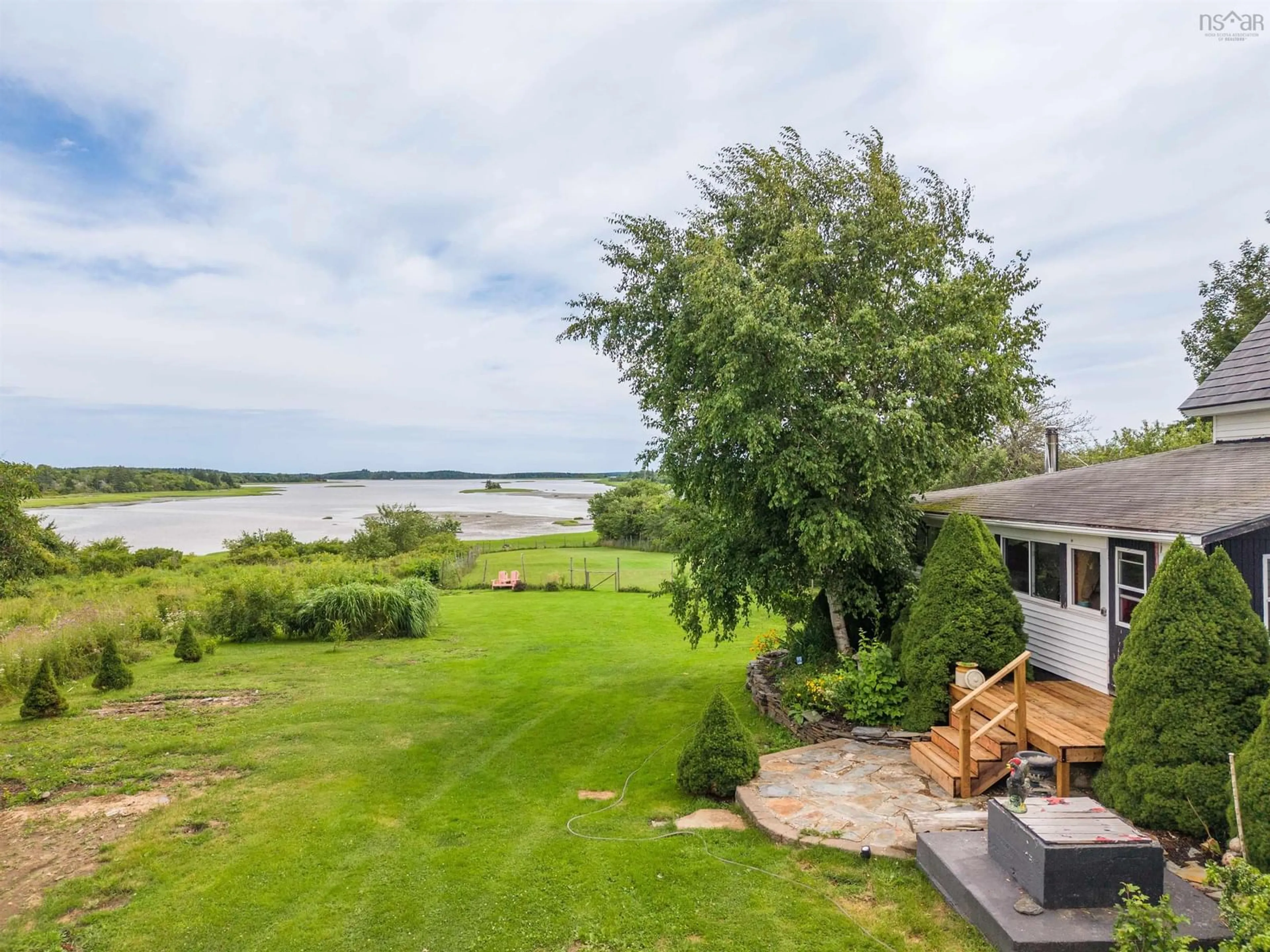 A pic from outside/outdoor area/front of a property/back of a property/a pic from drone, water/lake/river/ocean view for 7155 Highway 3, Ste. Anne Du Ruisseau Nova Scotia B0W 2X0