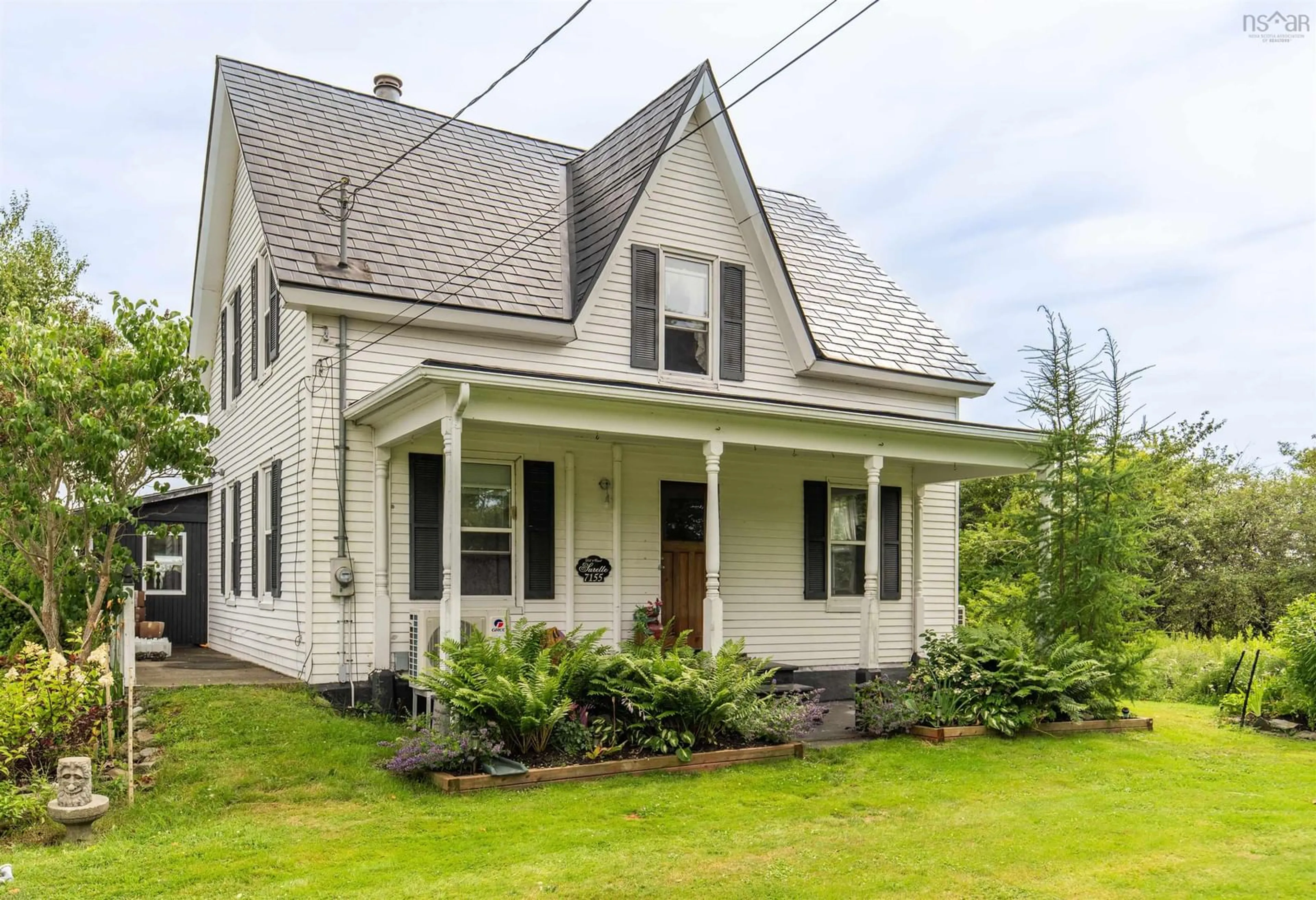 Home with vinyl exterior material, street for 7155 Highway 3, Ste. Anne Du Ruisseau Nova Scotia B0W 2X0
