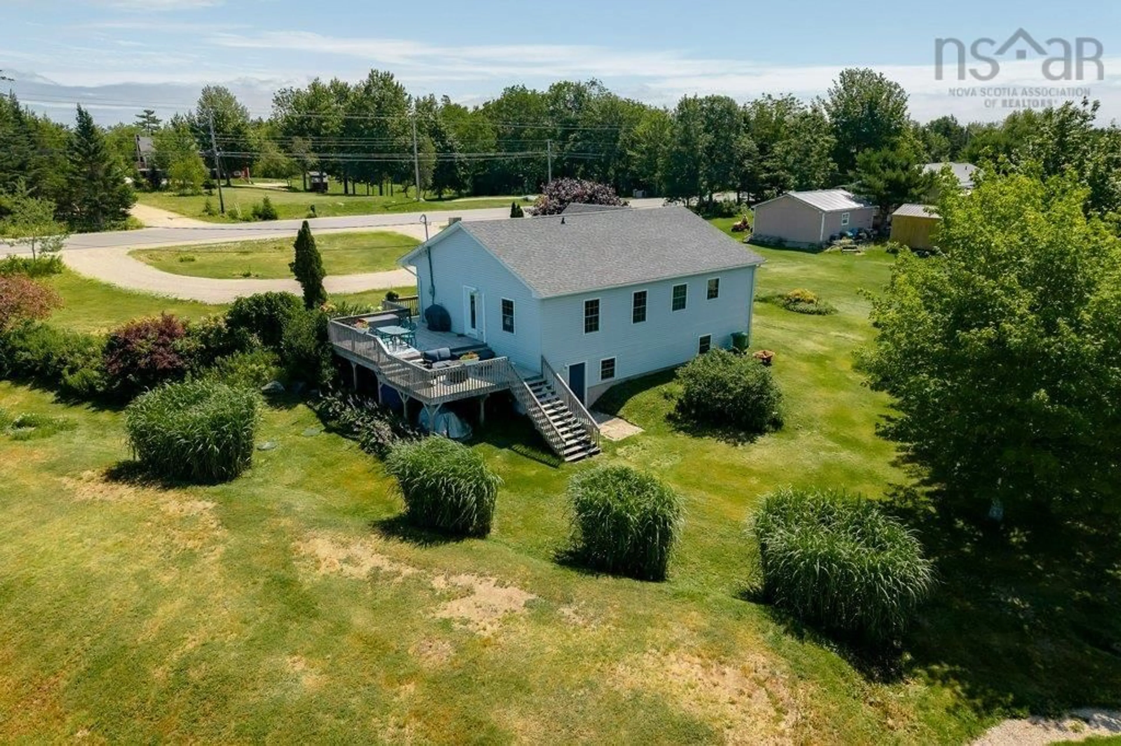 A pic from outside/outdoor area/front of a property/back of a property/a pic from drone, water/lake/river/ocean view for 349 Highway 14, Robinsons Corner Nova Scotia B0J 1J0