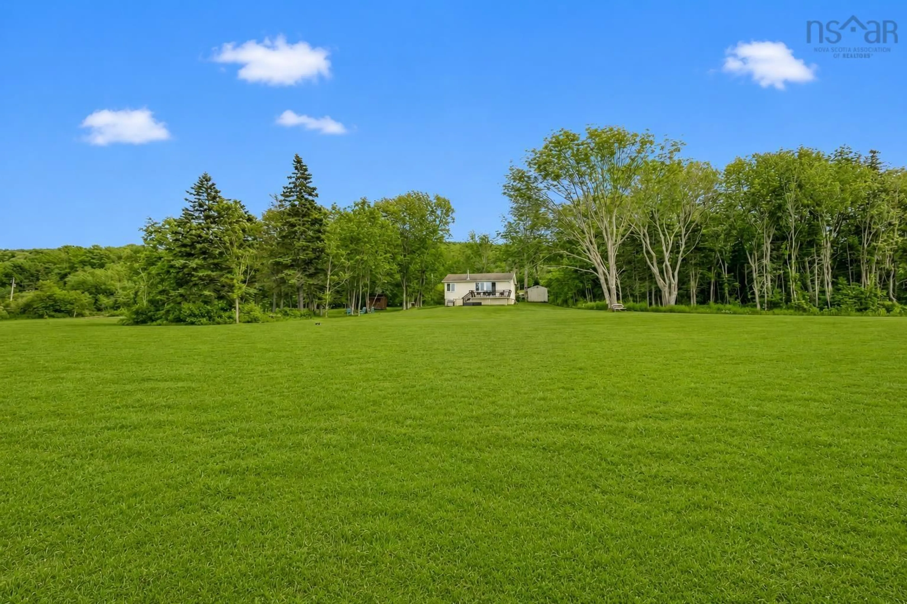A pic from outside/outdoor area/front of a property/back of a property/a pic from drone, forest/trees view for 7498 East Bay Hwy, Big Pond Nova Scotia B1J 1Y2