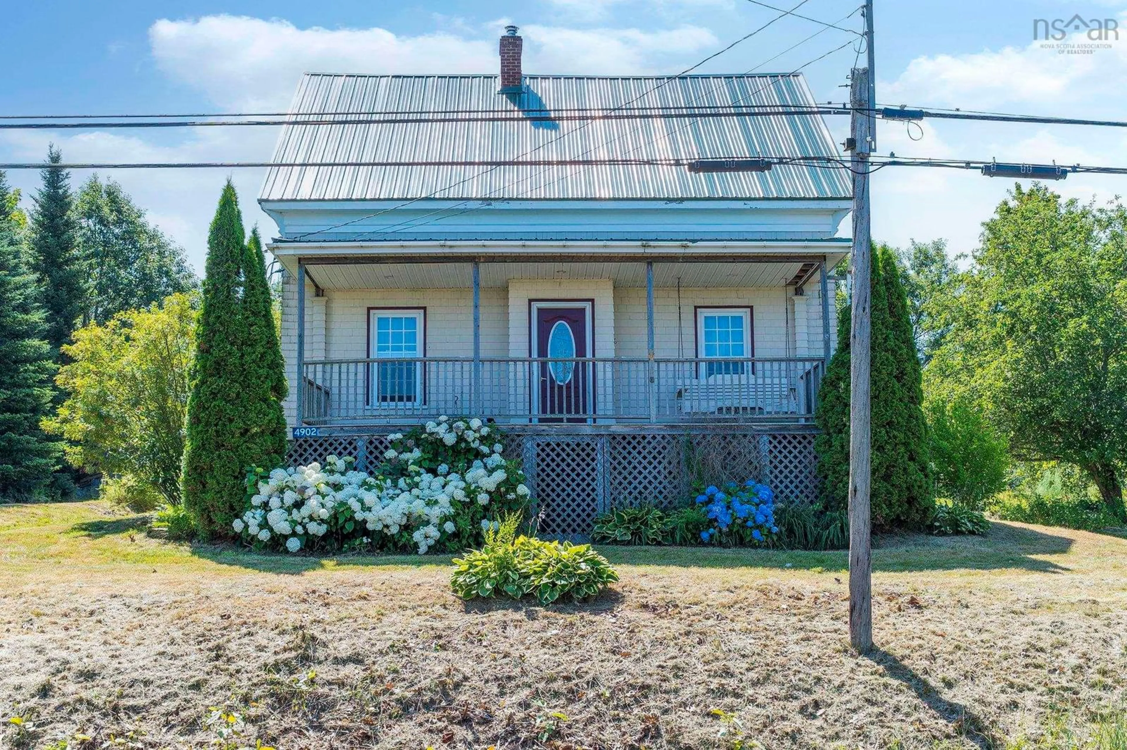 A pic from outside/outdoor area/front of a property/back of a property/a pic from drone, street for 4902 Highway 1, Waterville Nova Scotia B0P 1V0