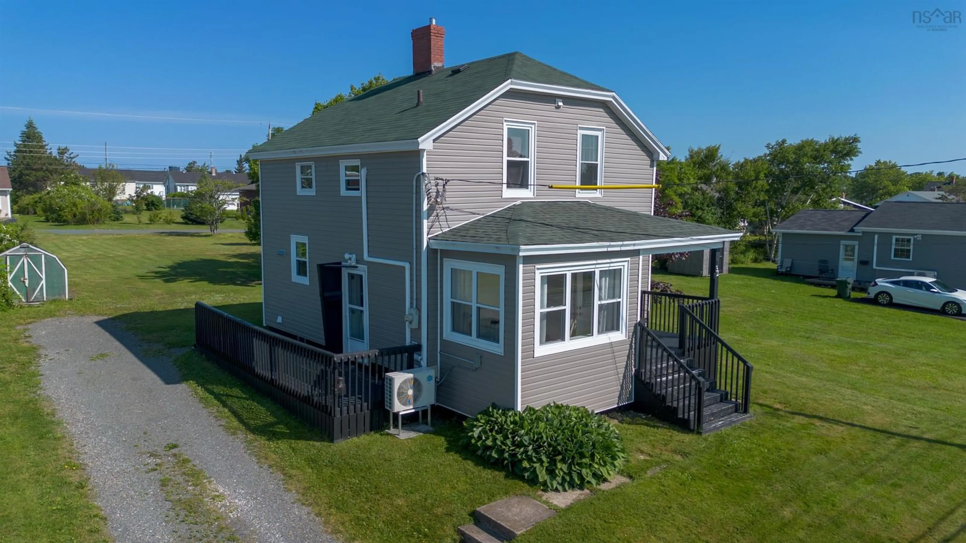 A pic from outside/outdoor area/front of a property/back of a property/a pic from drone, building for 32 Highland St, Glace Bay Nova Scotia B1A 2T5