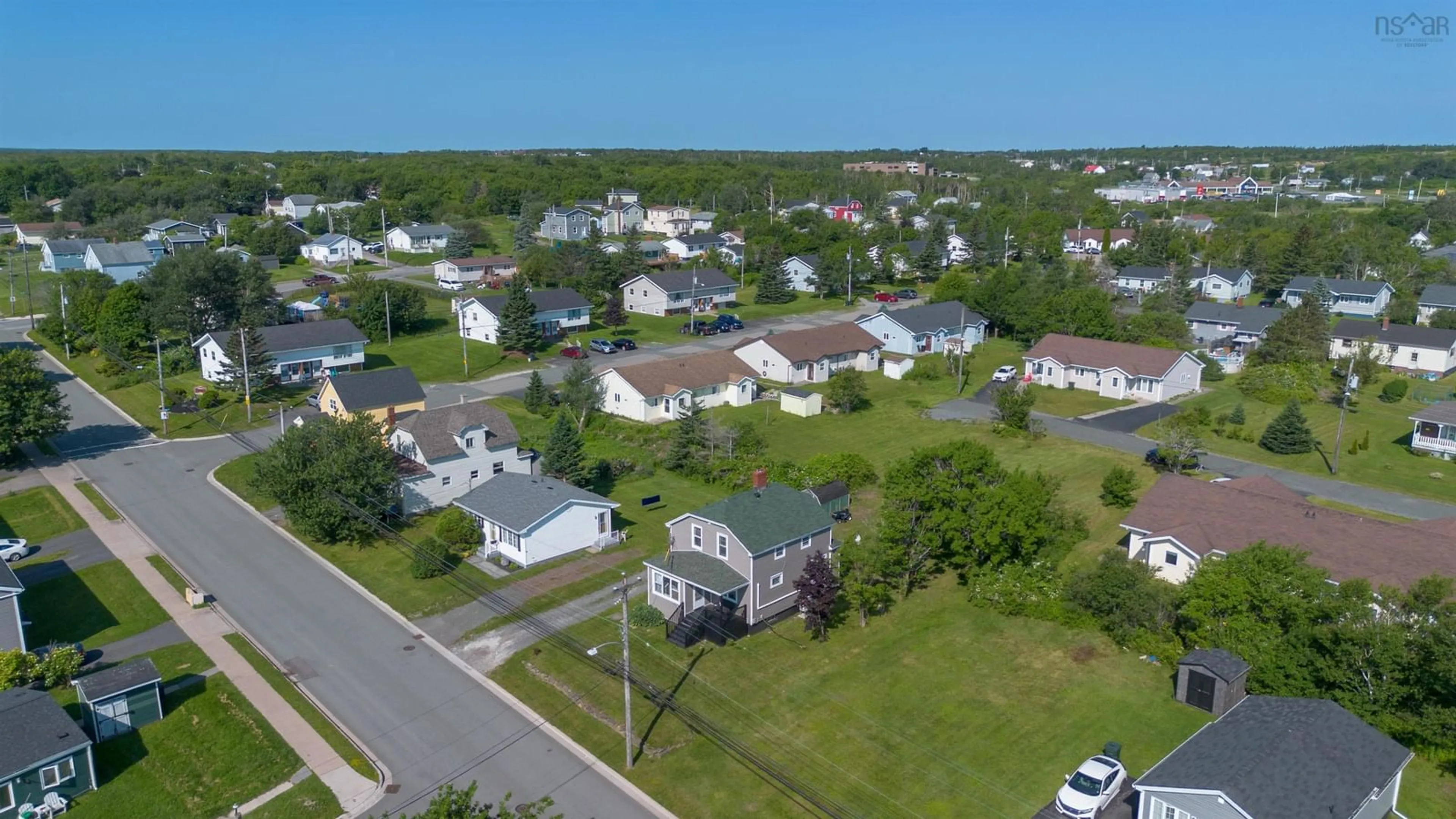 A pic from outside/outdoor area/front of a property/back of a property/a pic from drone, street for 32 Highland St, Glace Bay Nova Scotia B1A 2T5