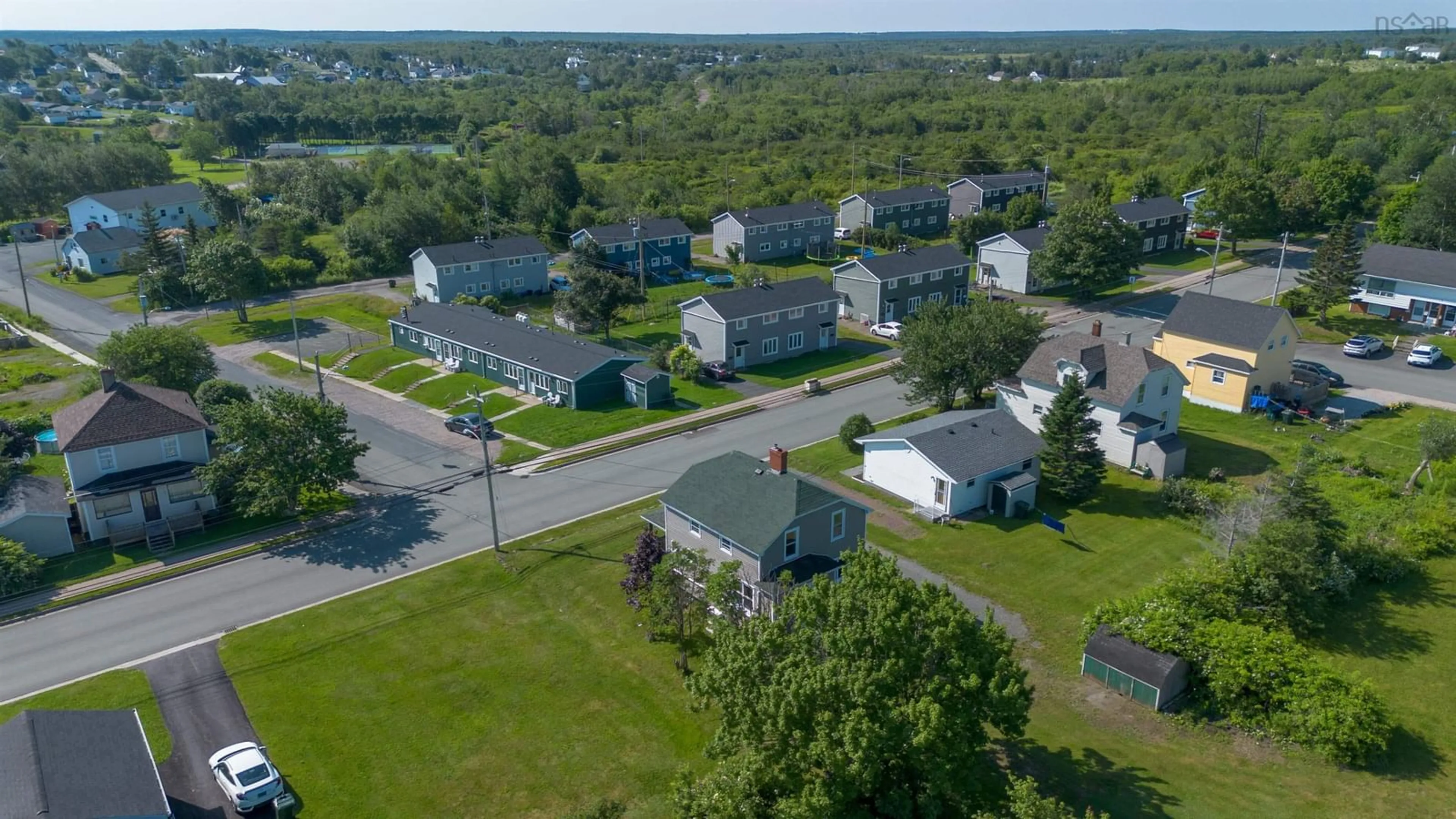 A pic from outside/outdoor area/front of a property/back of a property/a pic from drone, street for 32 Highland St, Glace Bay Nova Scotia B1A 2T5