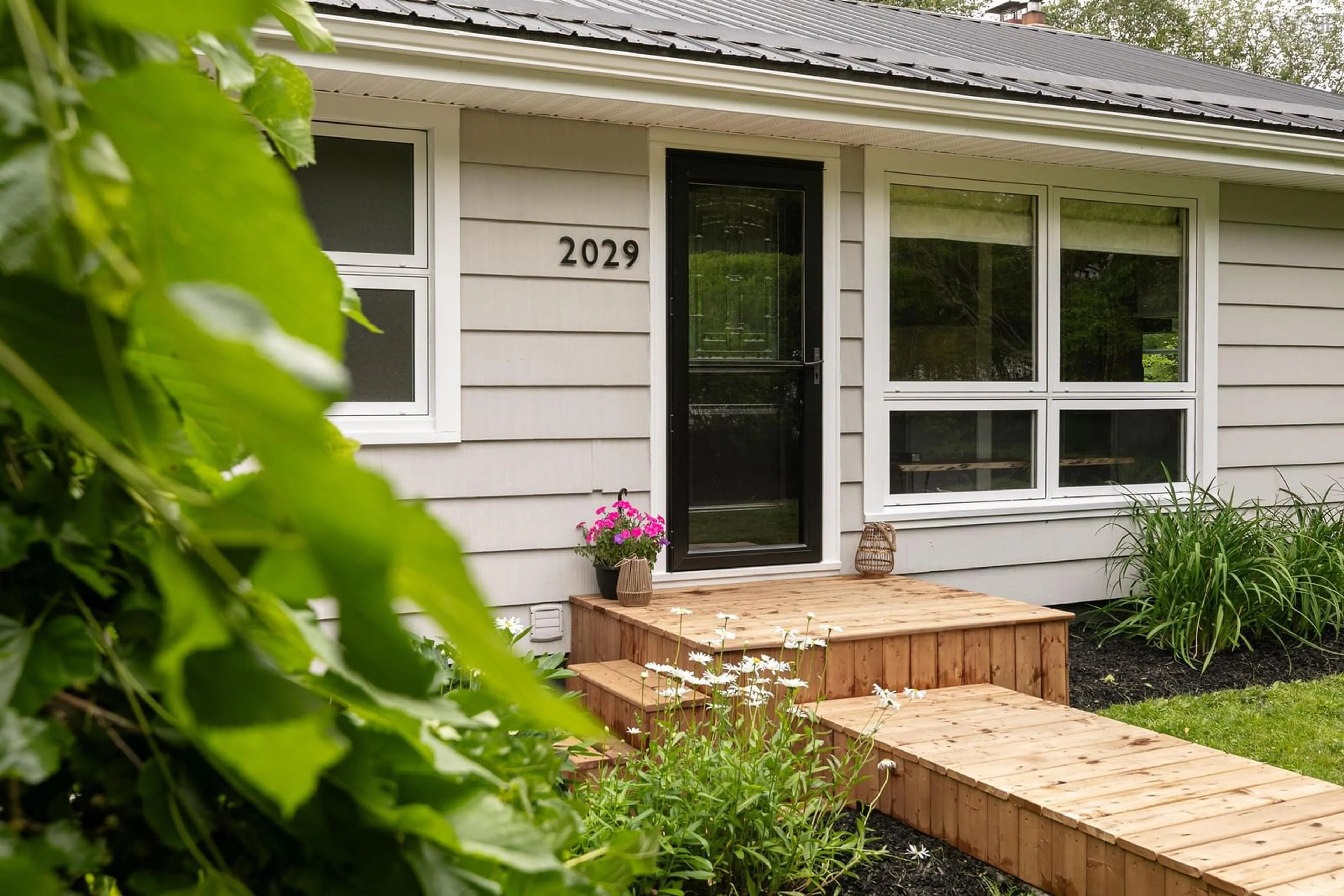 Home with vinyl exterior material, street for 2029 Purcells Cove Rd, Halifax Nova Scotia B3P 1C3