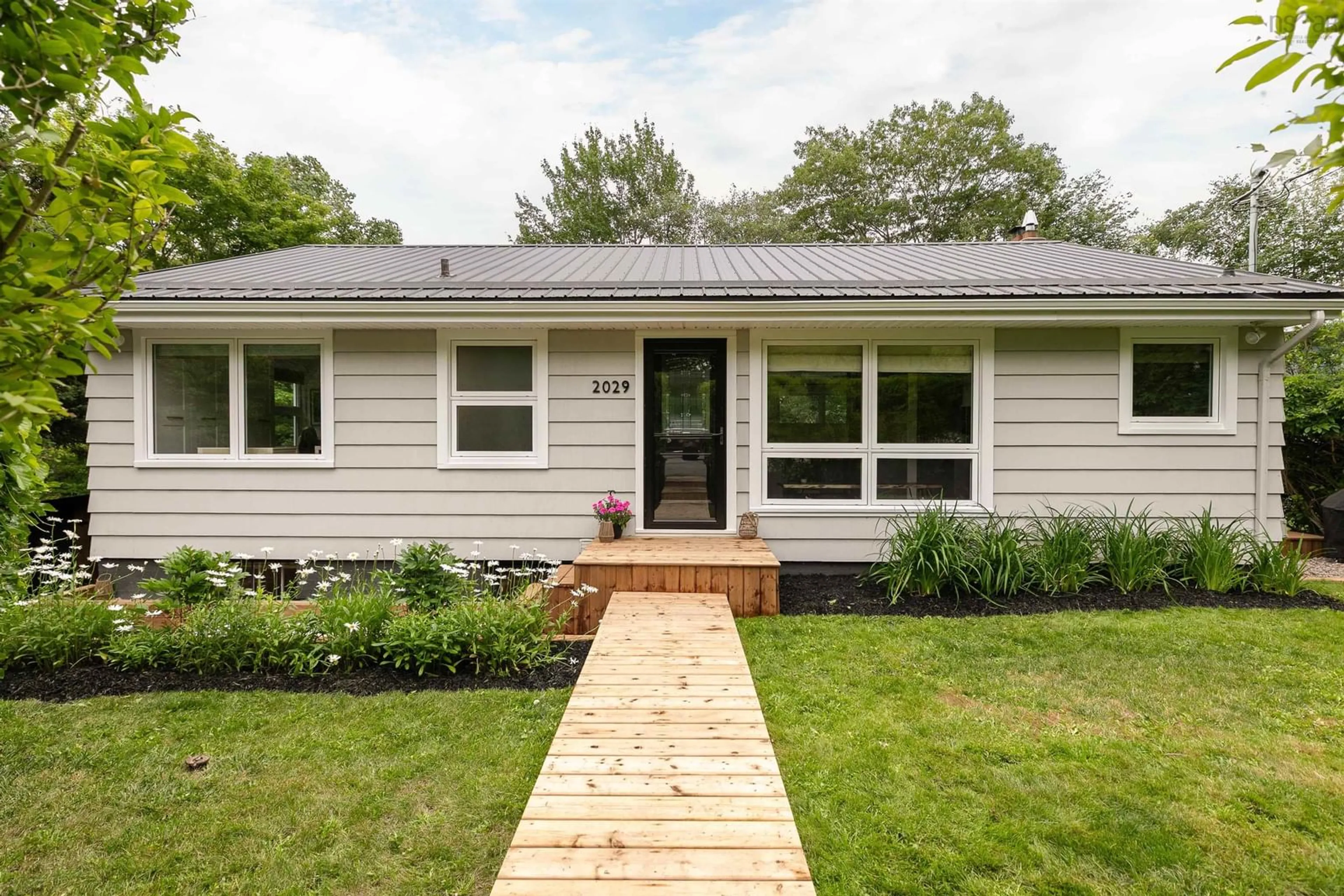 Home with vinyl exterior material, street for 2029 Purcells Cove Rd, Halifax Nova Scotia B3P 1C3