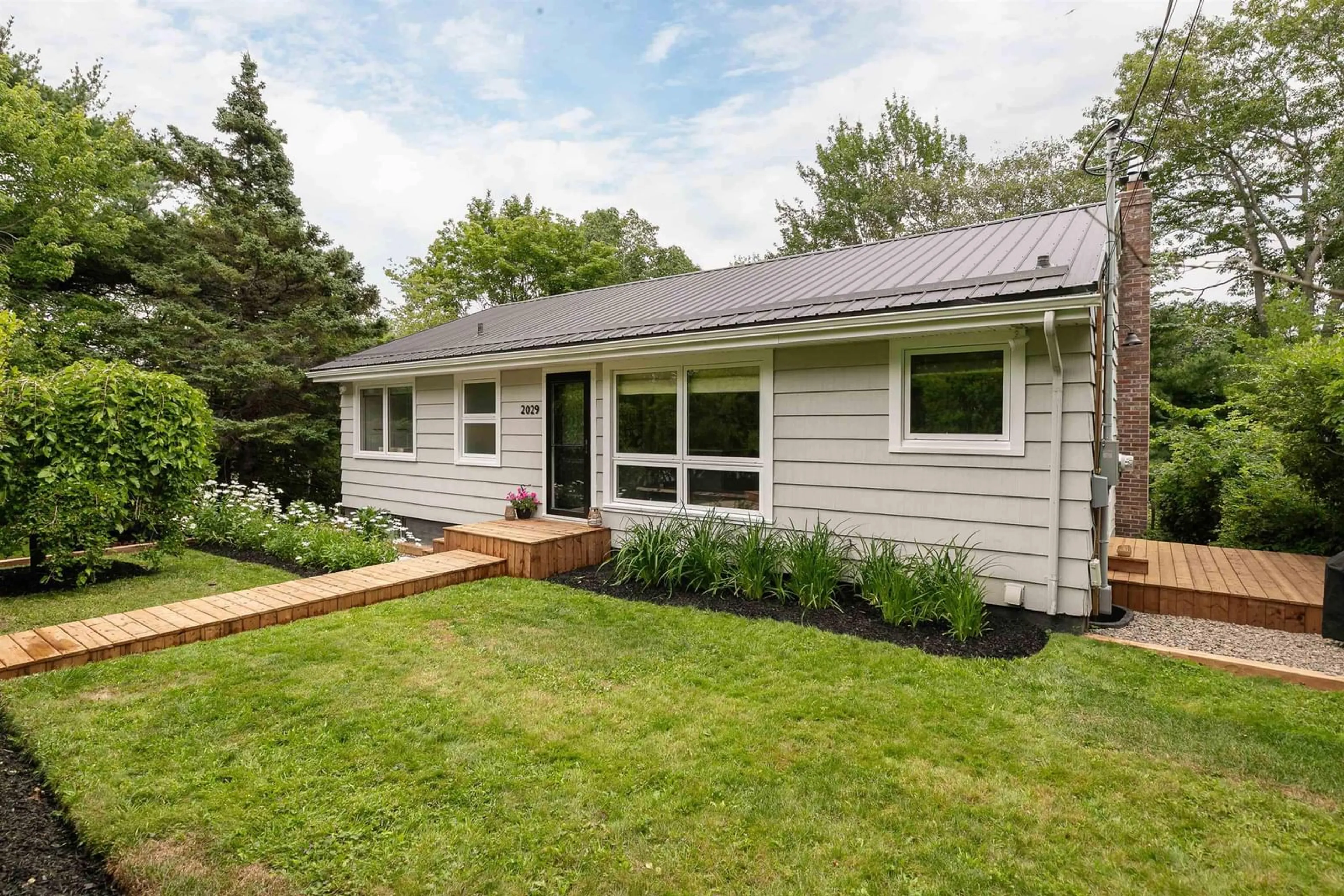 Home with vinyl exterior material, street for 2029 Purcells Cove Rd, Halifax Nova Scotia B3P 1C3
