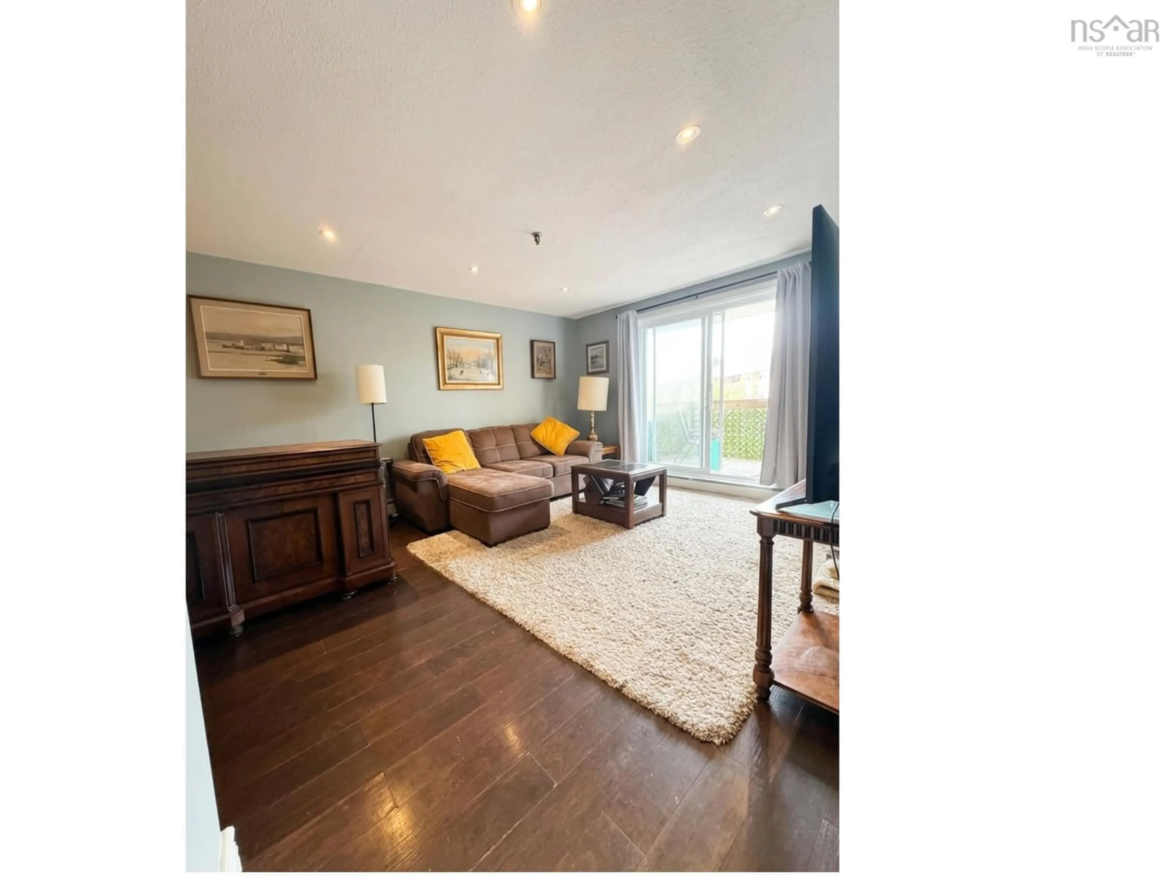 Living room with furniture, wood/laminate floor for 32 Veronica Dr #401, Halifax Nova Scotia B3N 3A3