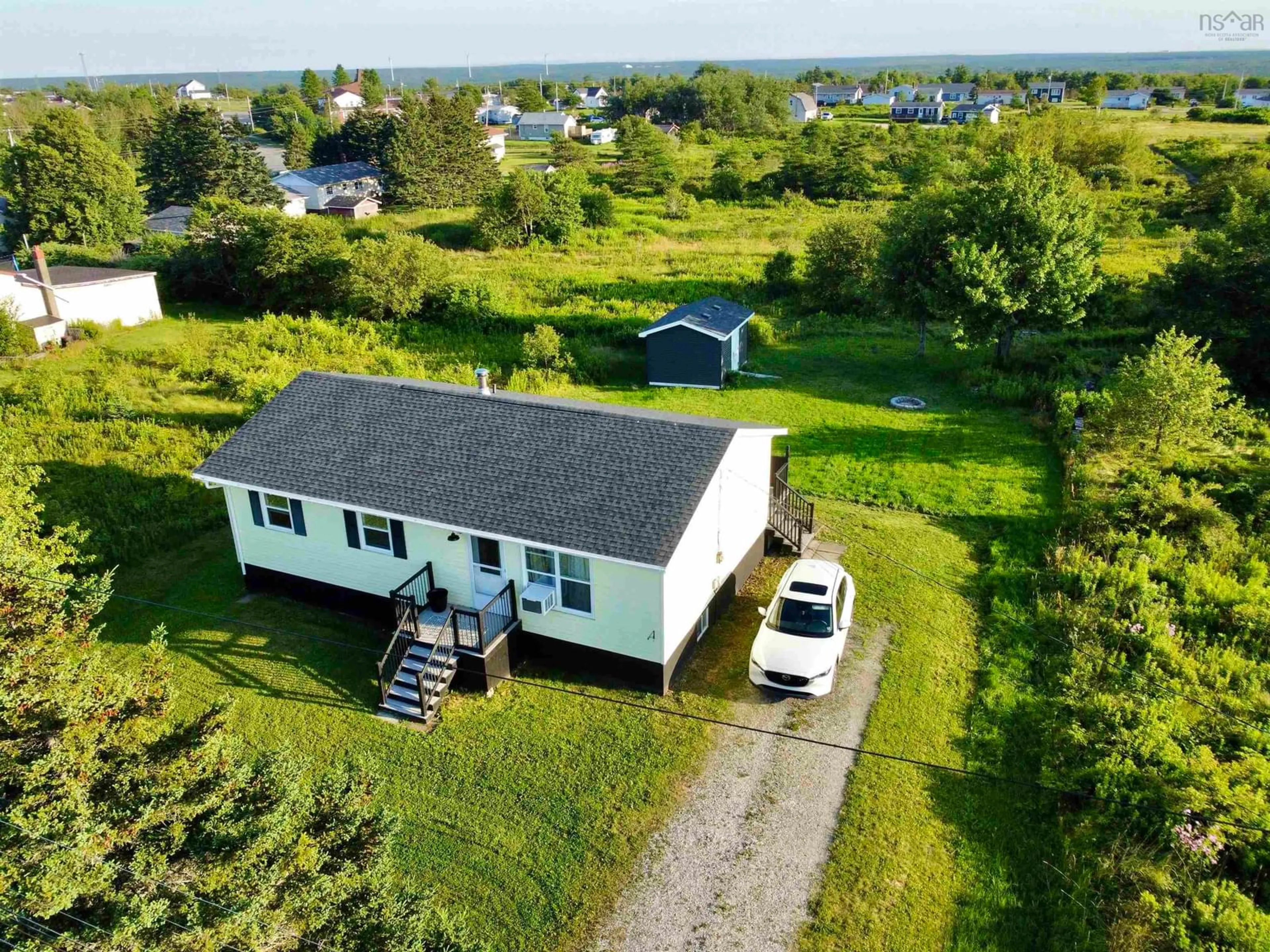 A pic from outside/outdoor area/front of a property/back of a property/a pic from drone, unknown for 45 King St, Scotchtown Nova Scotia B1H 1C7