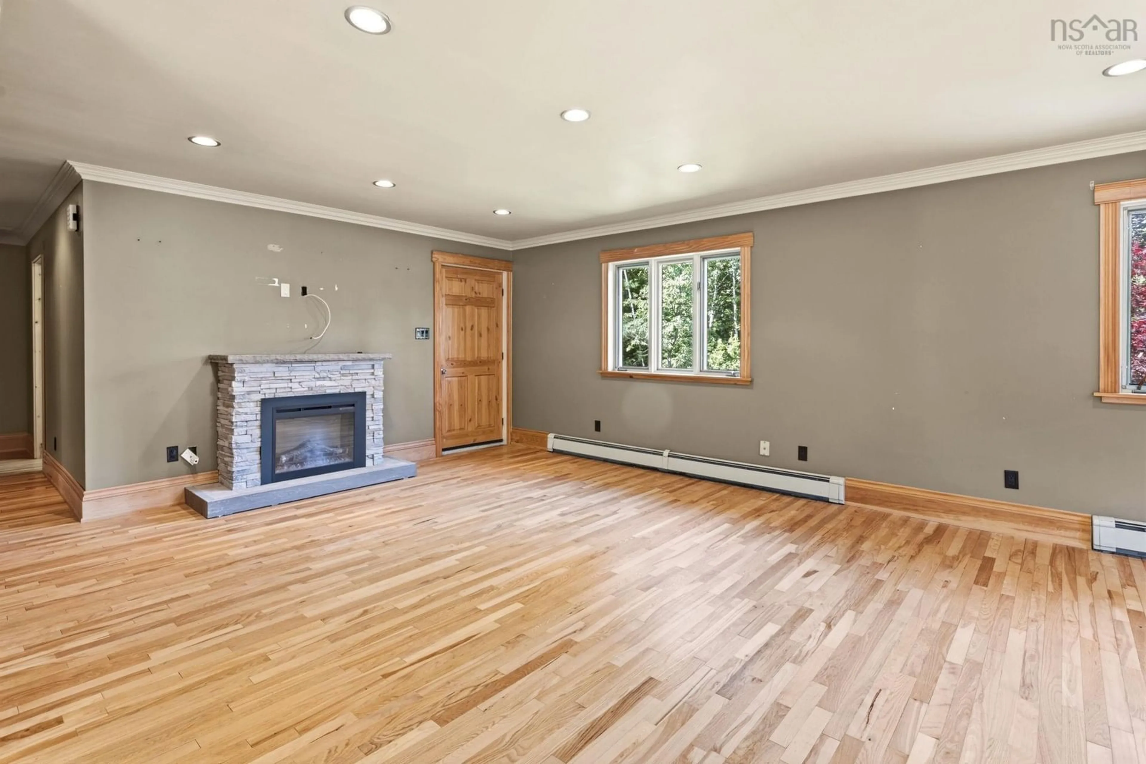 Living room with furniture, wood/laminate floor for 15 Meadow Brook Dr, Beaver Bank Nova Scotia B4G 1E2