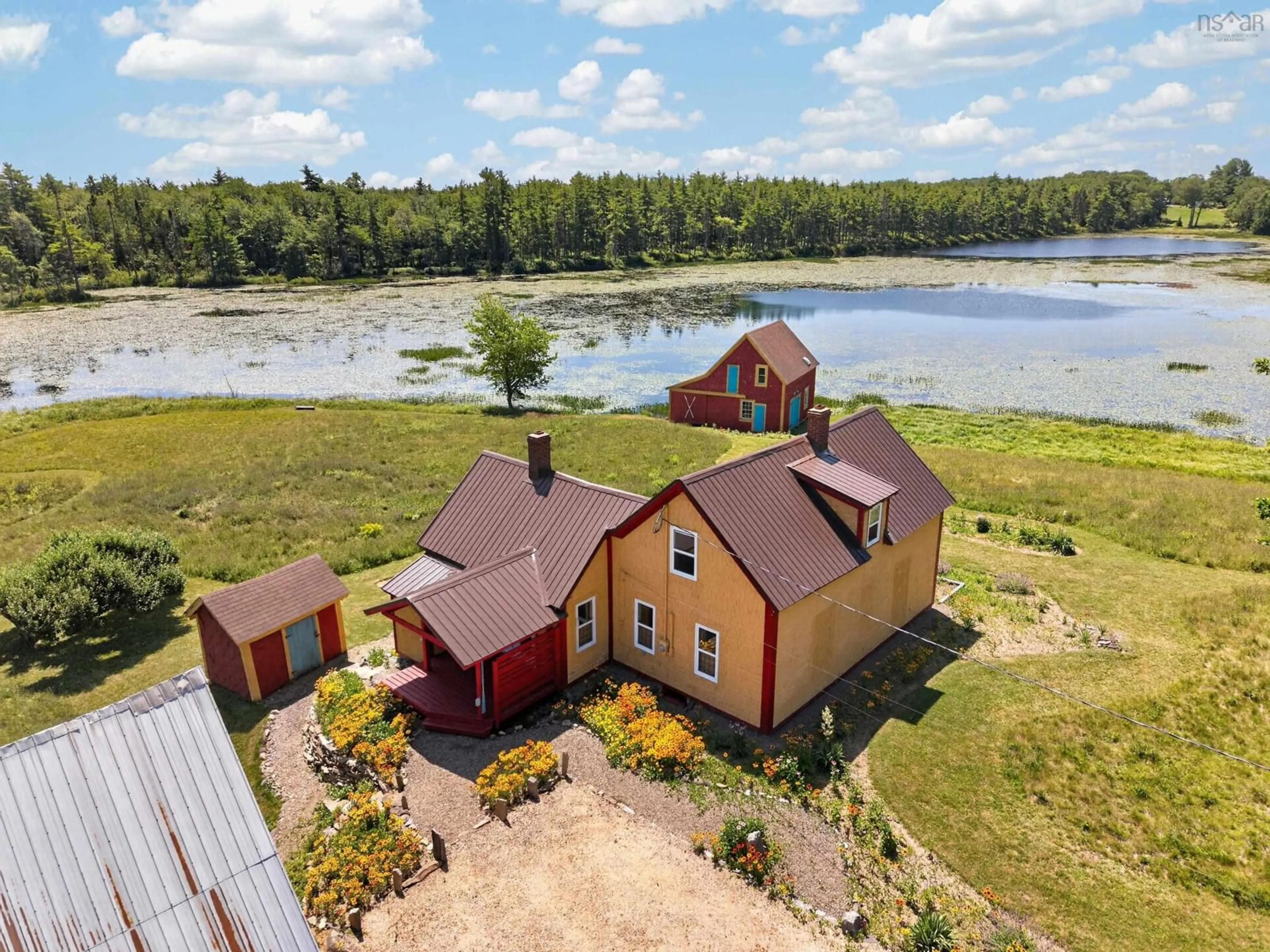 A pic from outside/outdoor area/front of a property/back of a property/a pic from drone, water/lake/river/ocean view for 5265 Highway 208, Pleasant River Nova Scotia B0T 1K0