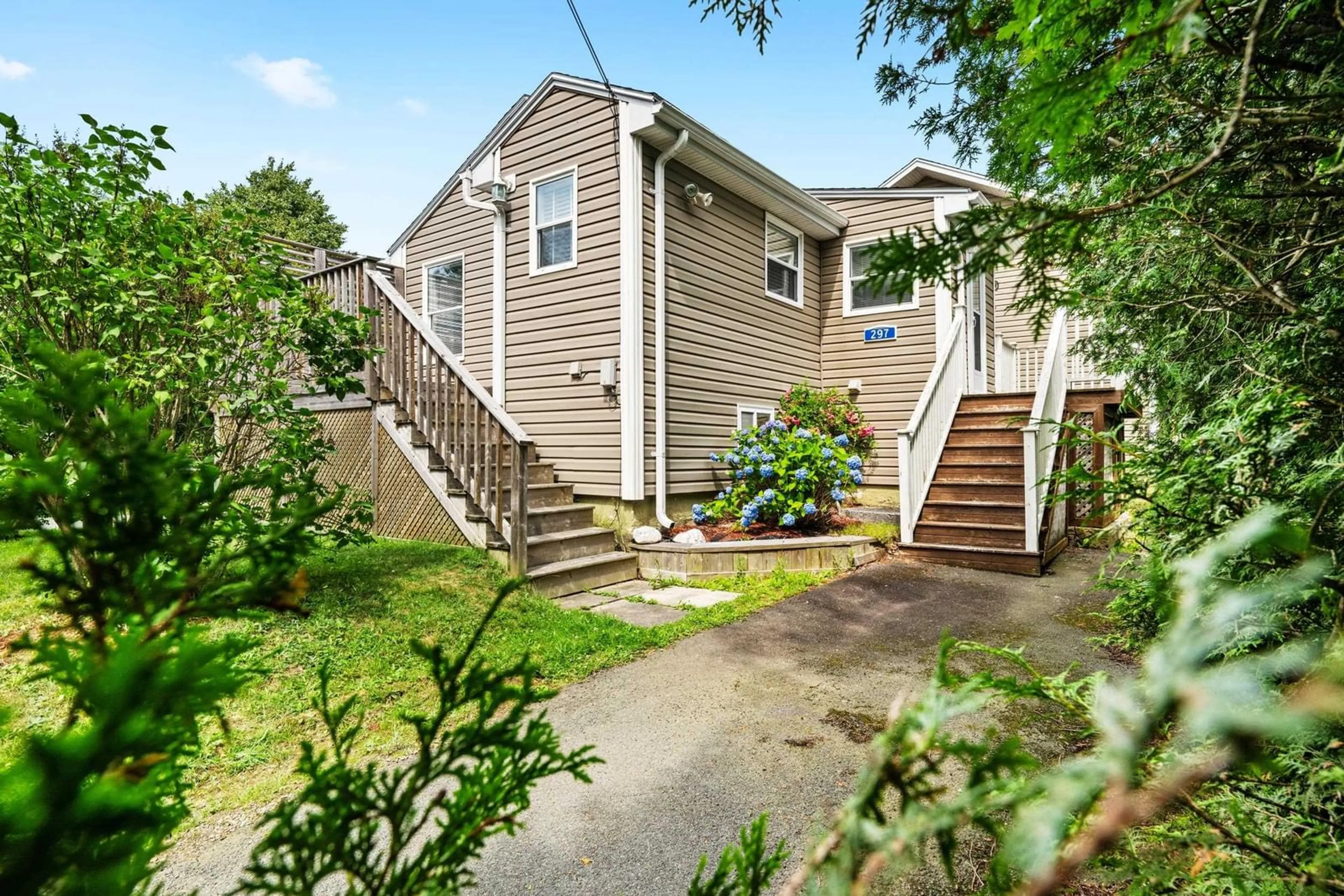 Home with vinyl exterior material, street for 299/297 Spencer Ave, Halifax Nova Scotia B3R 1S8