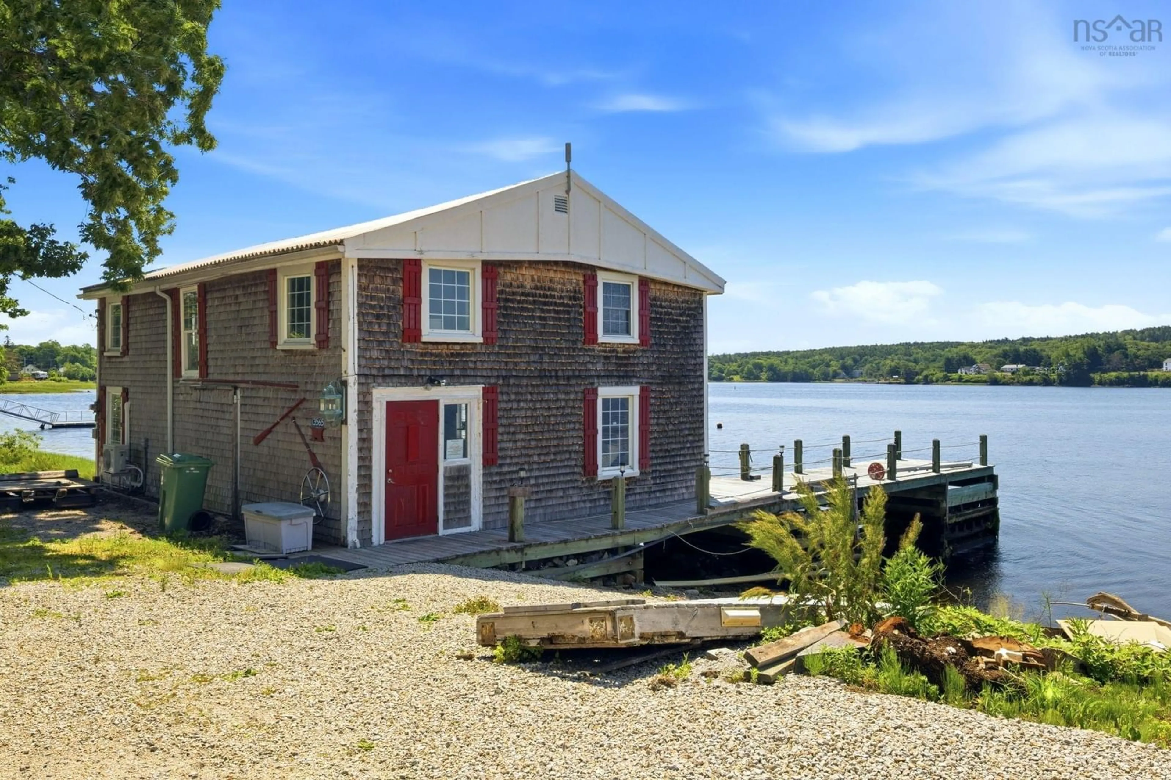 A pic from outside/outdoor area/front of a property/back of a property/a pic from drone, water/lake/river/ocean view for 13568 Highway 3, Dayspring Nova Scotia B4V 5P2