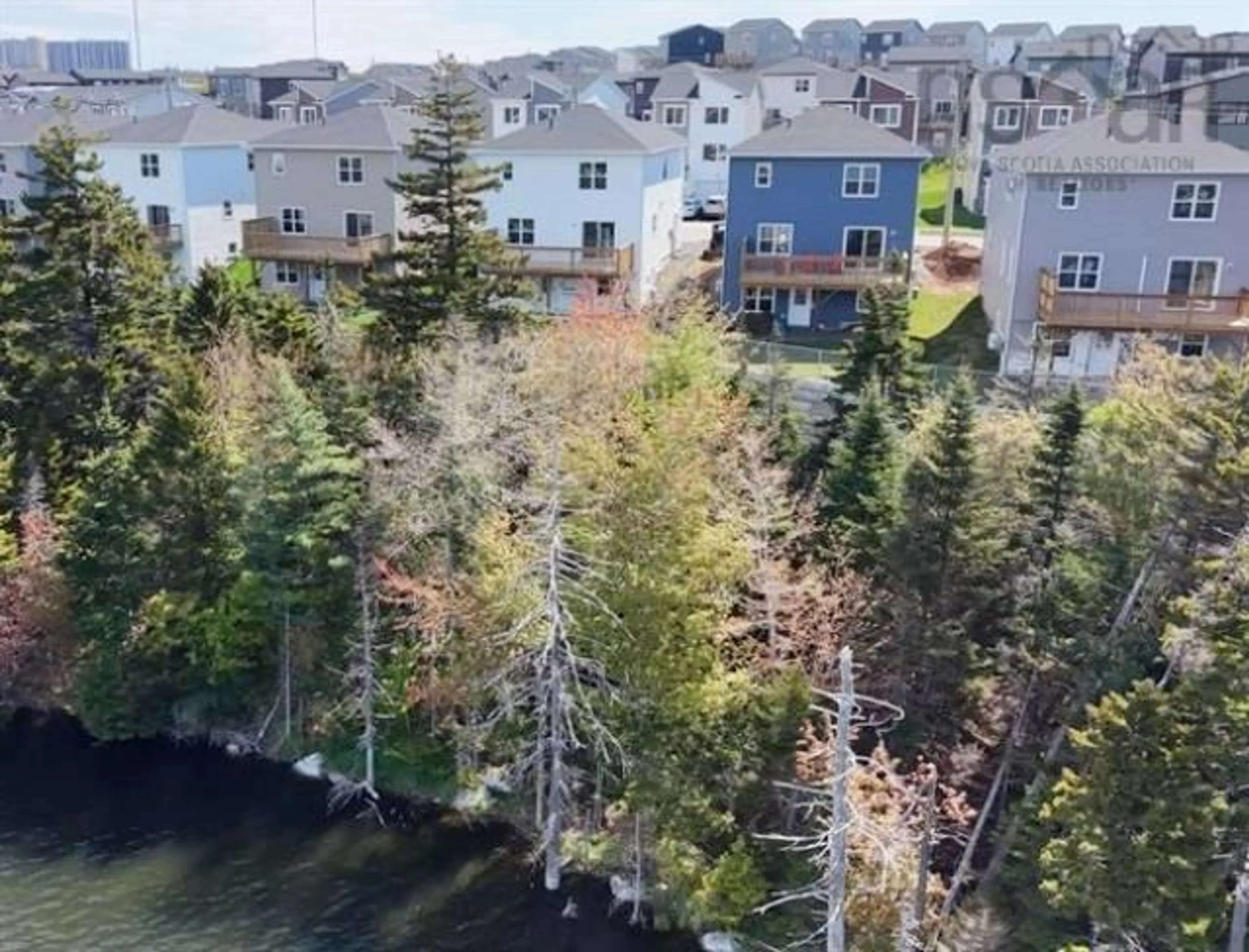 A pic from outside/outdoor area/front of a property/back of a property/a pic from drone, water/lake/river/ocean view for 103 Flatrock Crescent, Beechville Nova Scotia B3T 0N4