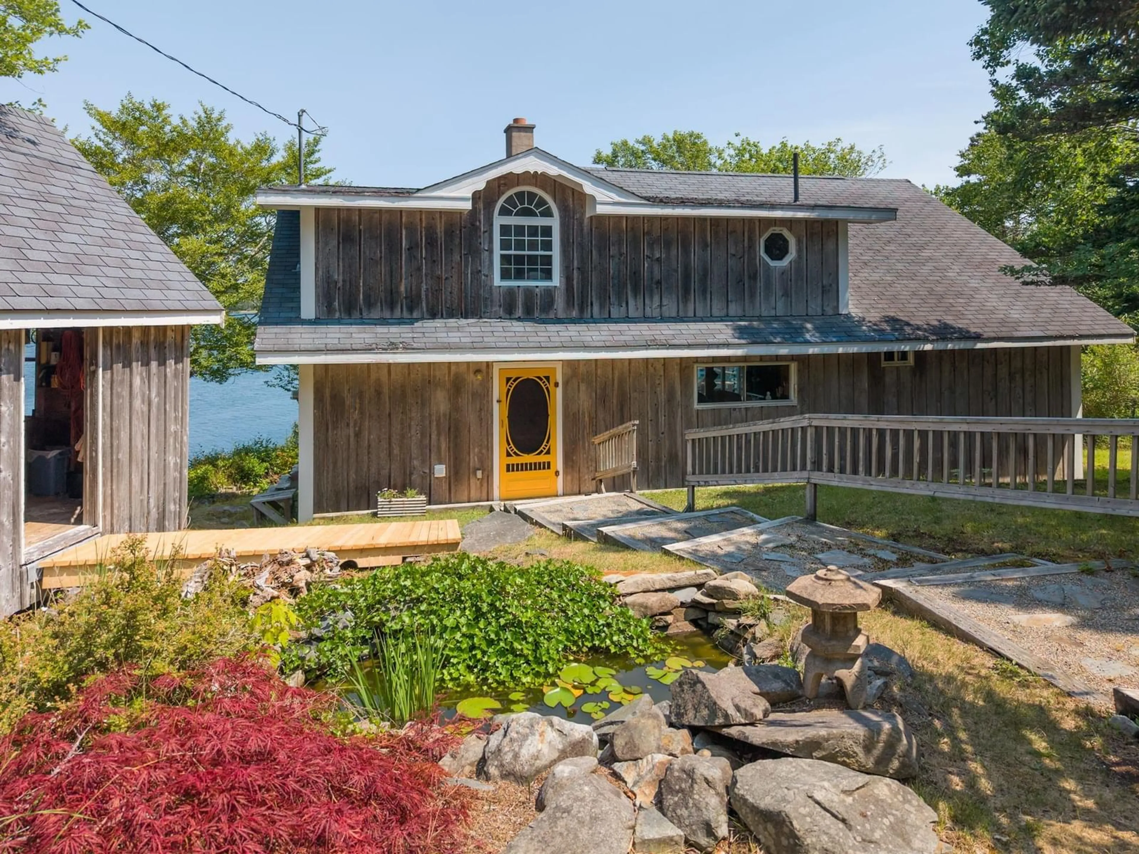 A pic from outside/outdoor area/front of a property/back of a property/a pic from drone, water/lake/river/ocean view for 390-406 Highway 308, Morris Island Nova Scotia B0W 3M0