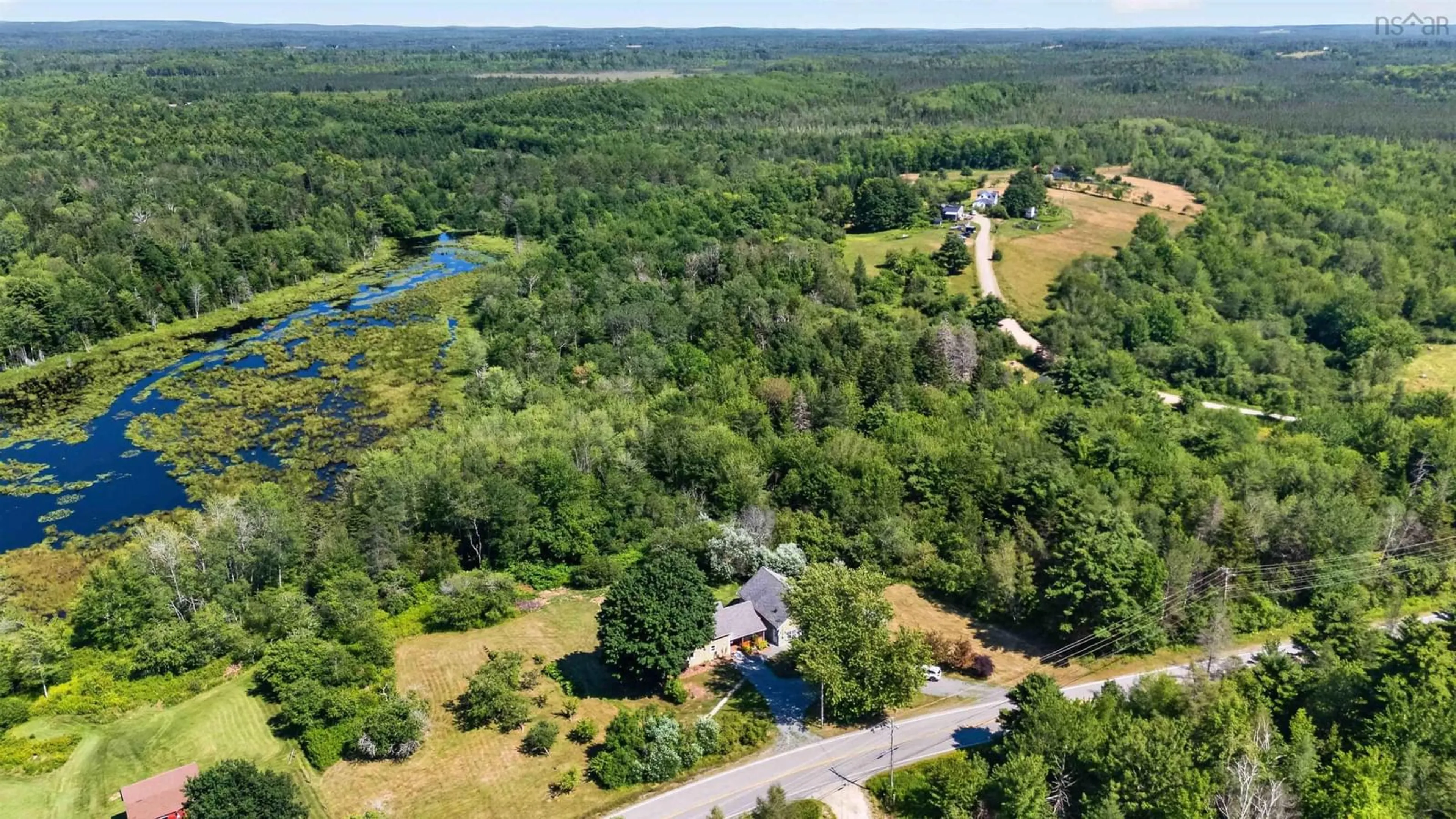 A pic from outside/outdoor area/front of a property/back of a property/a pic from drone, forest/trees view for 1959 Highway 208, Hemford Nova Scotia B0R 1E0