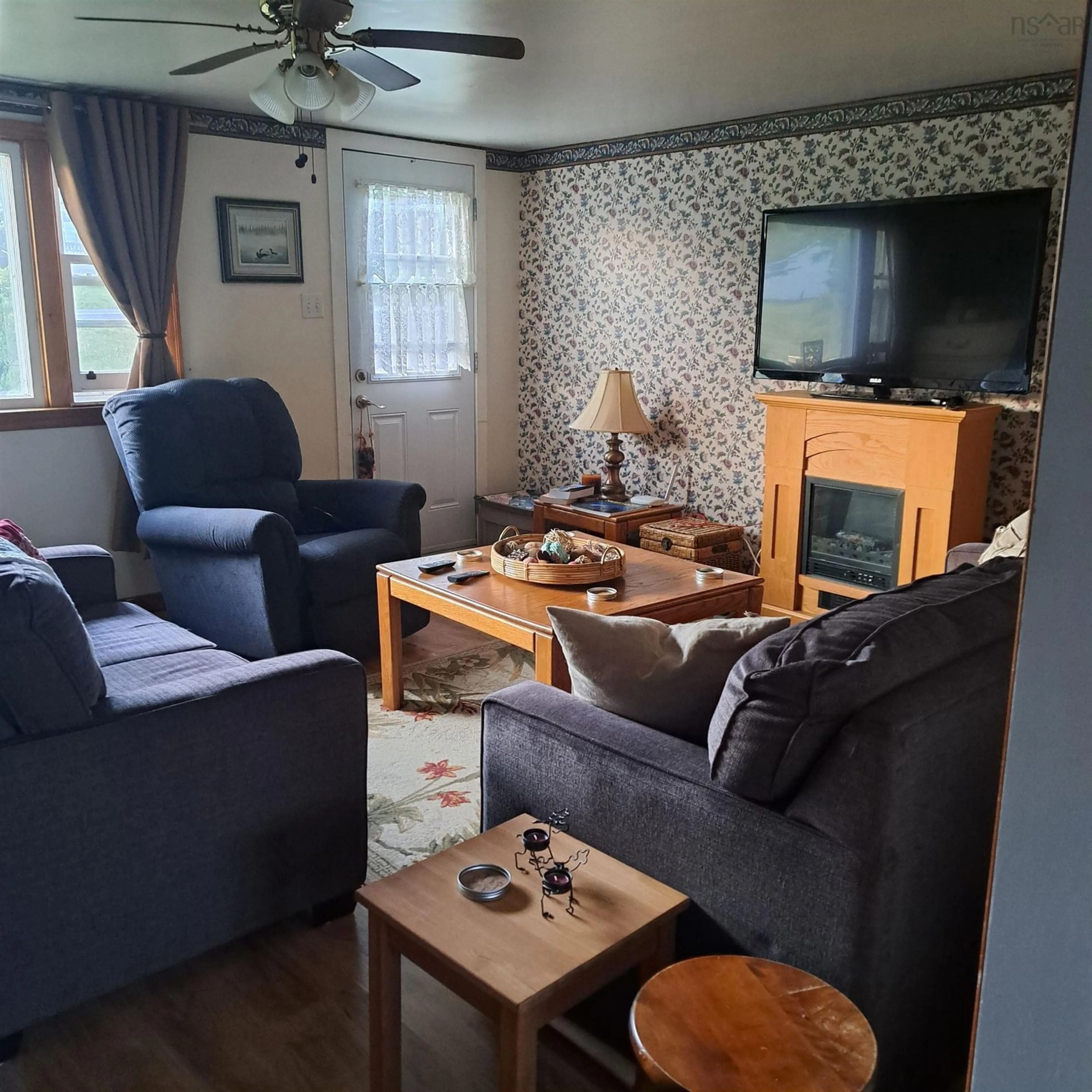 Living room with furniture, unknown for 4540 Highway 2, Upper Economy Nova Scotia B0M 1J0