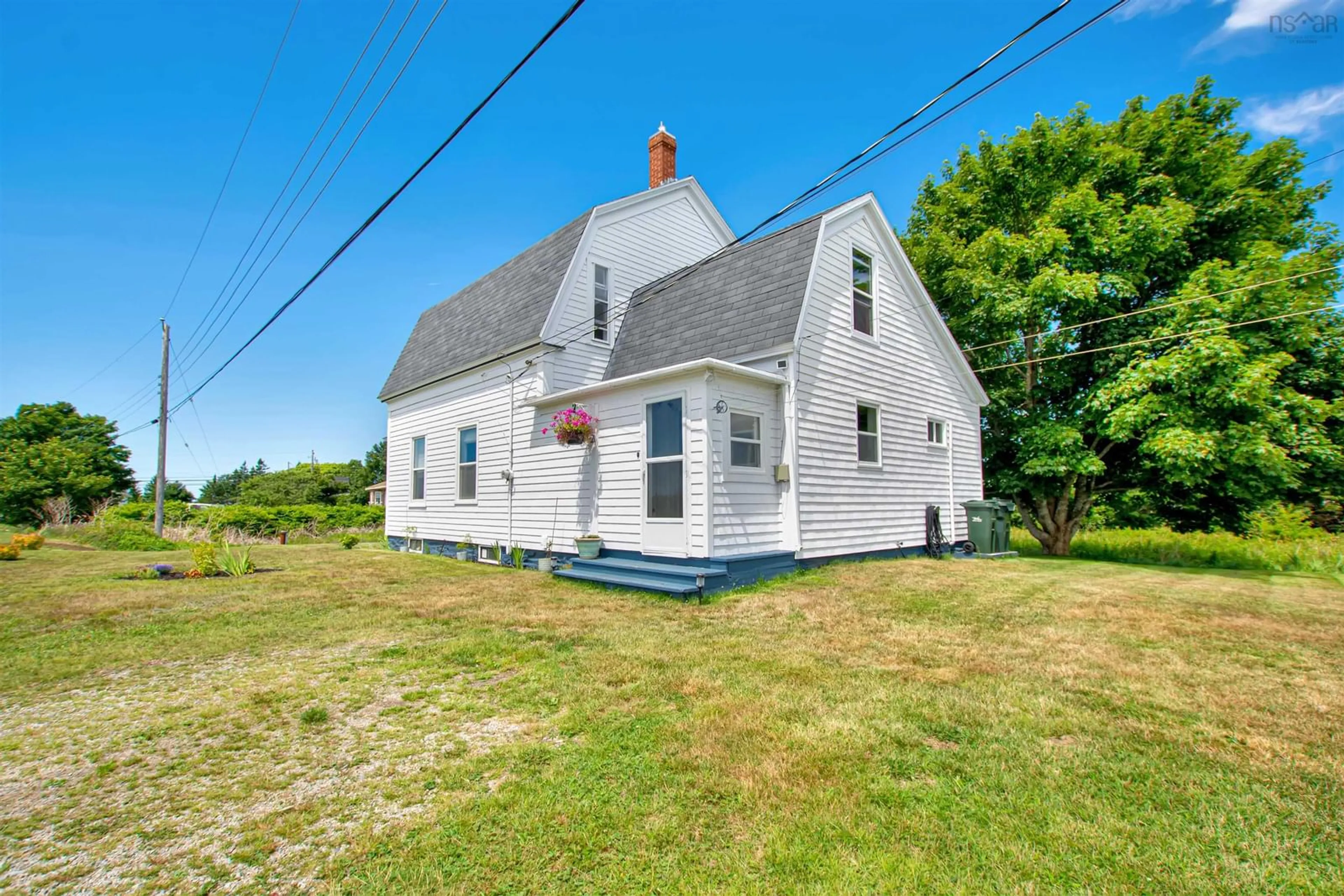 A pic from outside/outdoor area/front of a property/back of a property/a pic from drone, building for 21 Sams Rd, West Pubnico Nova Scotia B0W 3S0