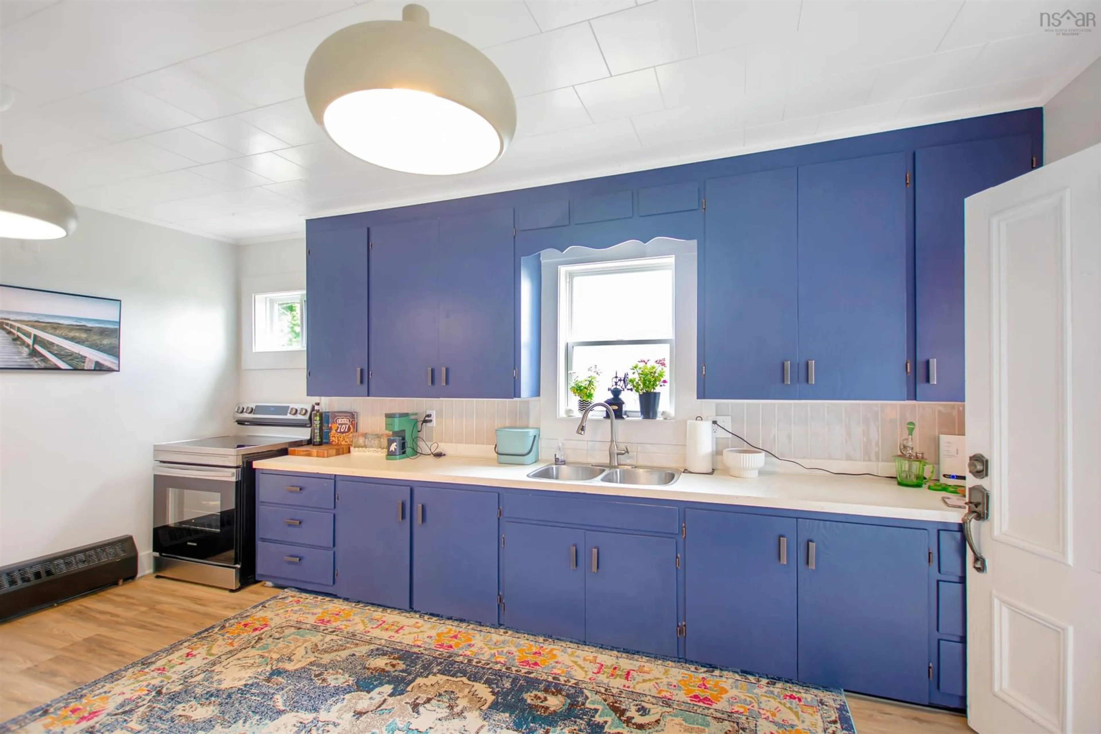 Contemporary kitchen, ceramic/tile floor for 21 Sams Rd, West Pubnico Nova Scotia B0W 3S0