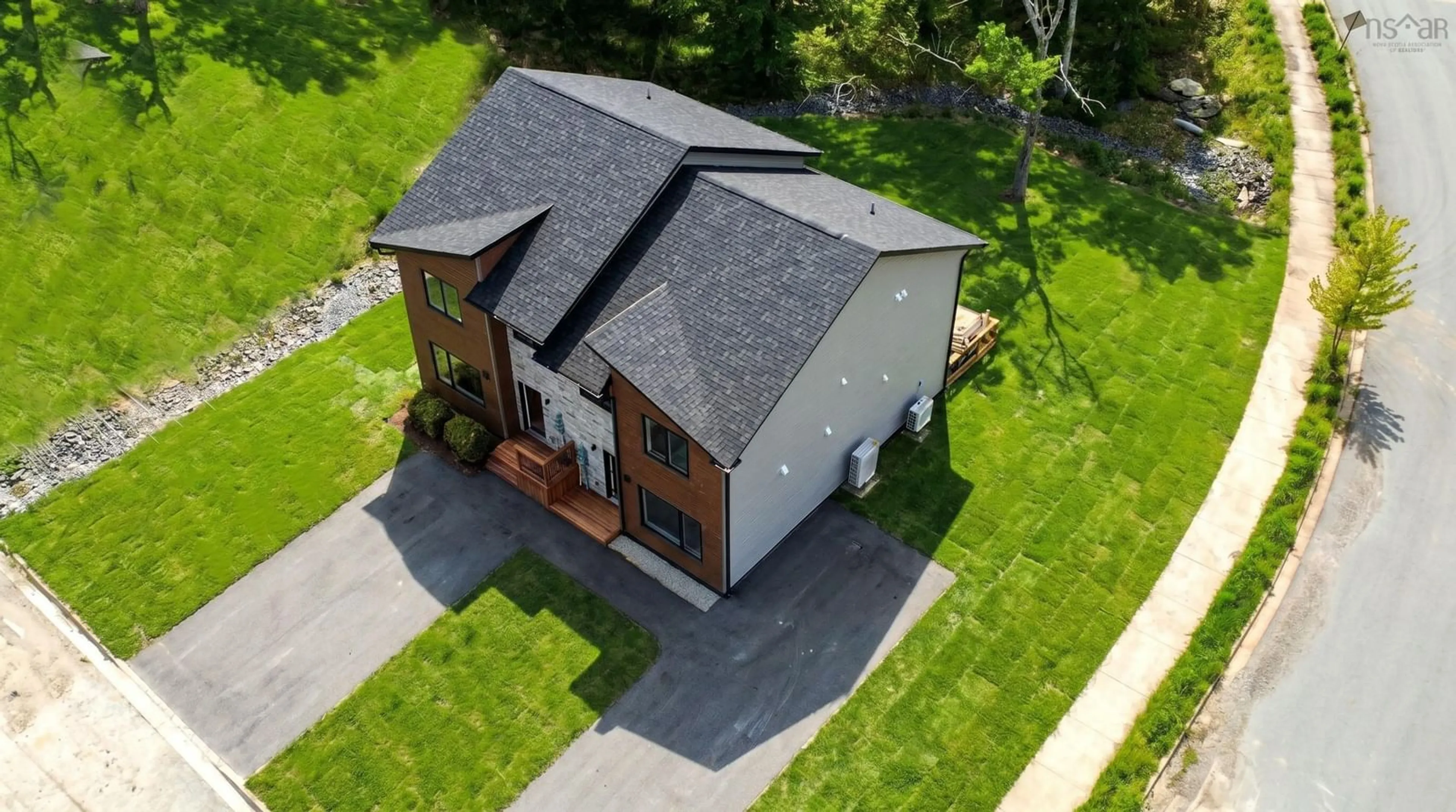 A pic from outside/outdoor area/front of a property/back of a property/a pic from drone, street for 54 Heckman Ave, Bridgewater Nova Scotia B4V 2H2