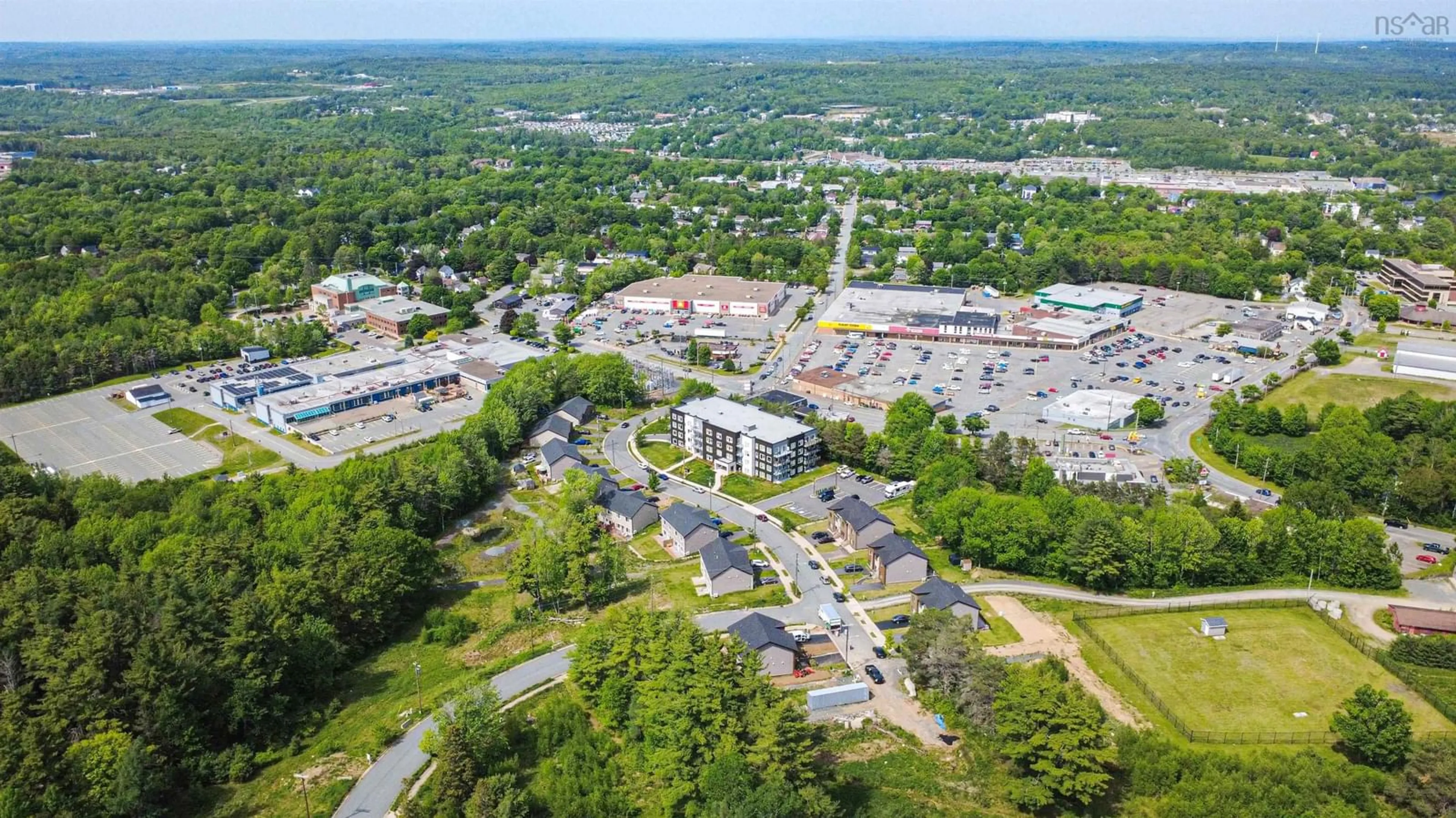 A pic from outside/outdoor area/front of a property/back of a property/a pic from drone, unknown for 54 Heckman Ave, Bridgewater Nova Scotia B4V 2H2