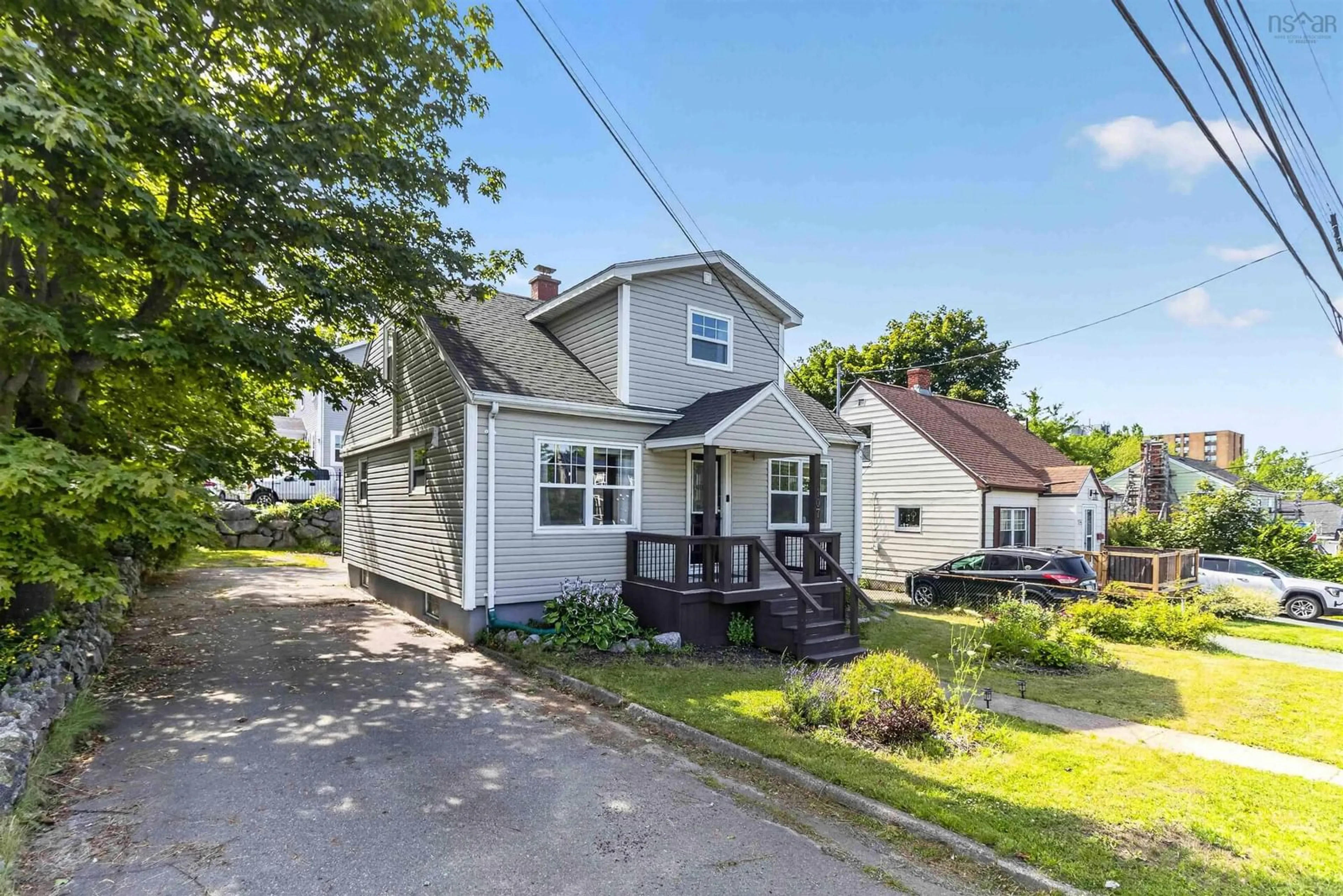 A pic from outside/outdoor area/front of a property/back of a property/a pic from drone, street for 107 Herring Cove Rd, Halifax Nova Scotia B3P 1K5