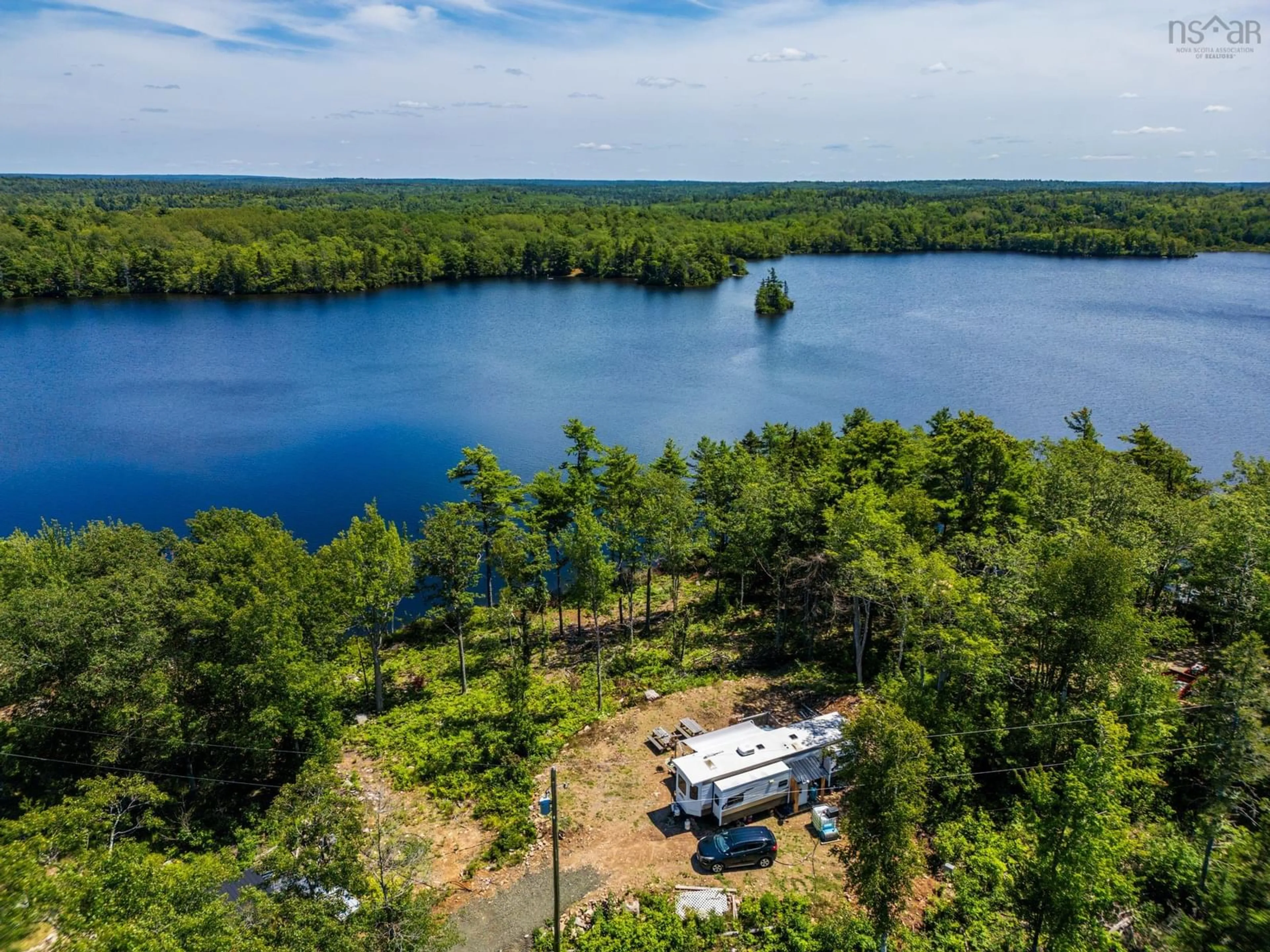 A pic from outside/outdoor area/front of a property/back of a property/a pic from drone, water/lake/river/ocean view for 33 Acorn Lane, Lake La Rose Nova Scotia B0S 1A0