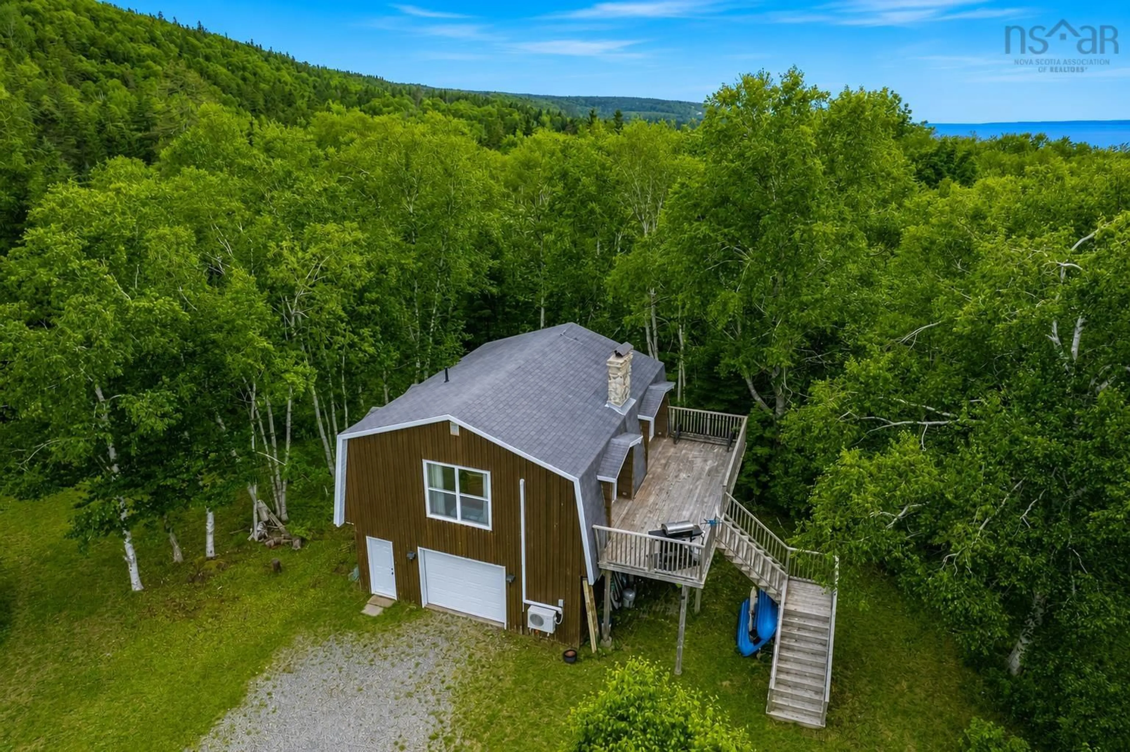 A pic from outside/outdoor area/front of a property/back of a property/a pic from drone, unknown for 8456 East Bay Hwy, Big Pond Centre Nova Scotia B1J 1Z6