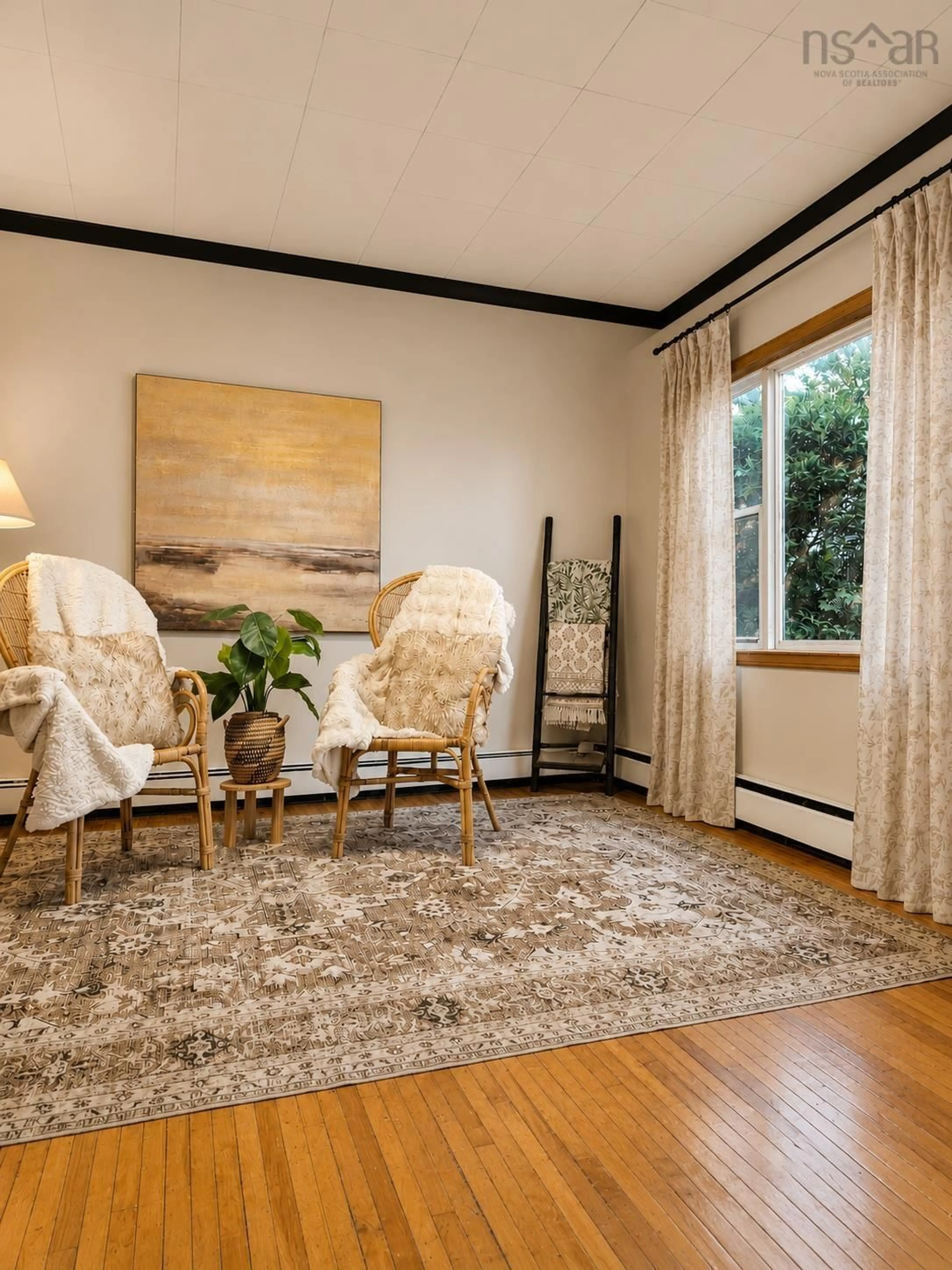 Living room with furniture, carpet floor for 61 Leonard St, Sydney Nova Scotia B1S 2T5