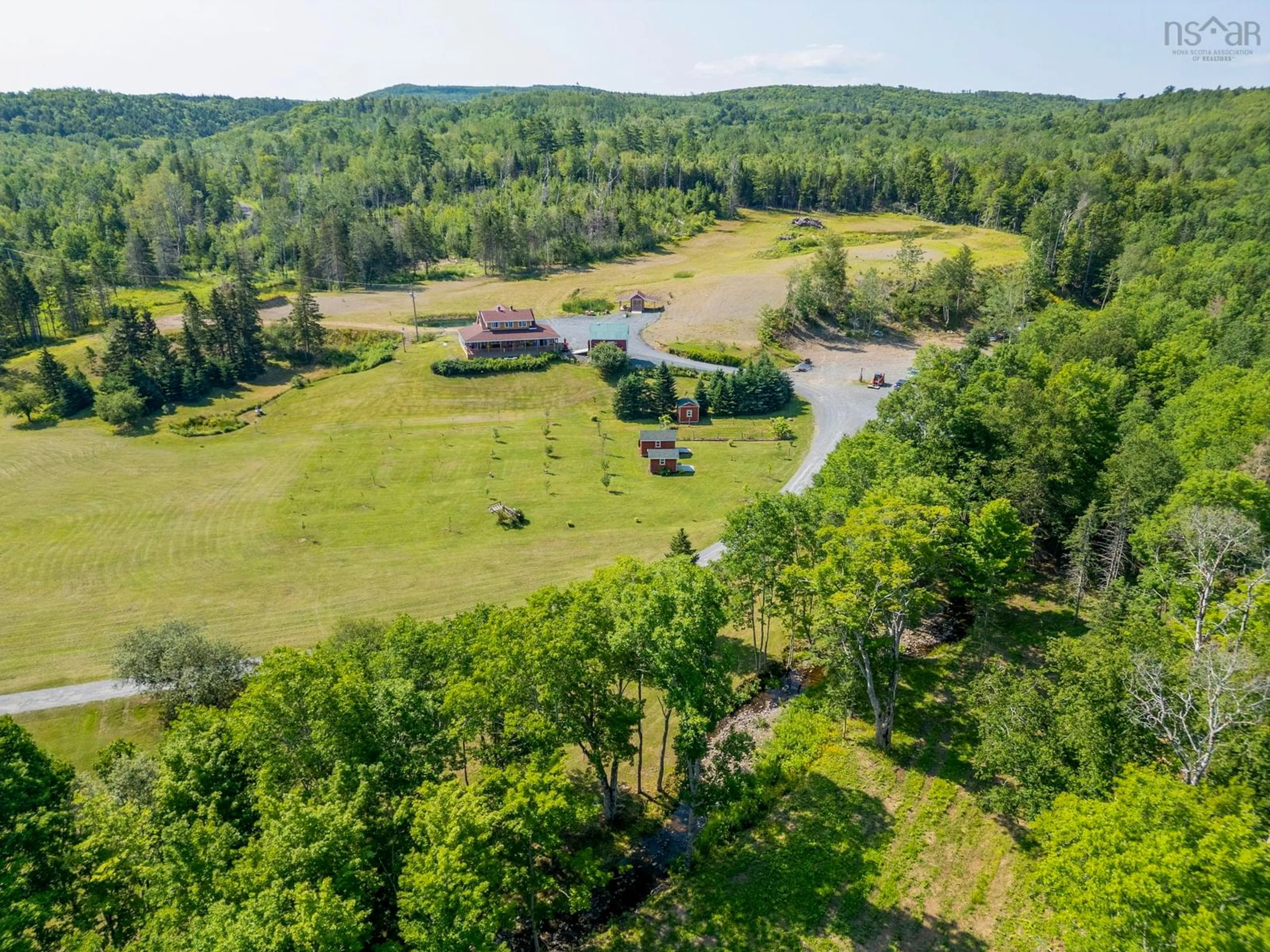 A pic from outside/outdoor area/front of a property/back of a property/a pic from drone, water/lake/river/ocean view for 1013 Fall Brook Rd, Mcphersons Mills Nova Scotia B2H 5C8