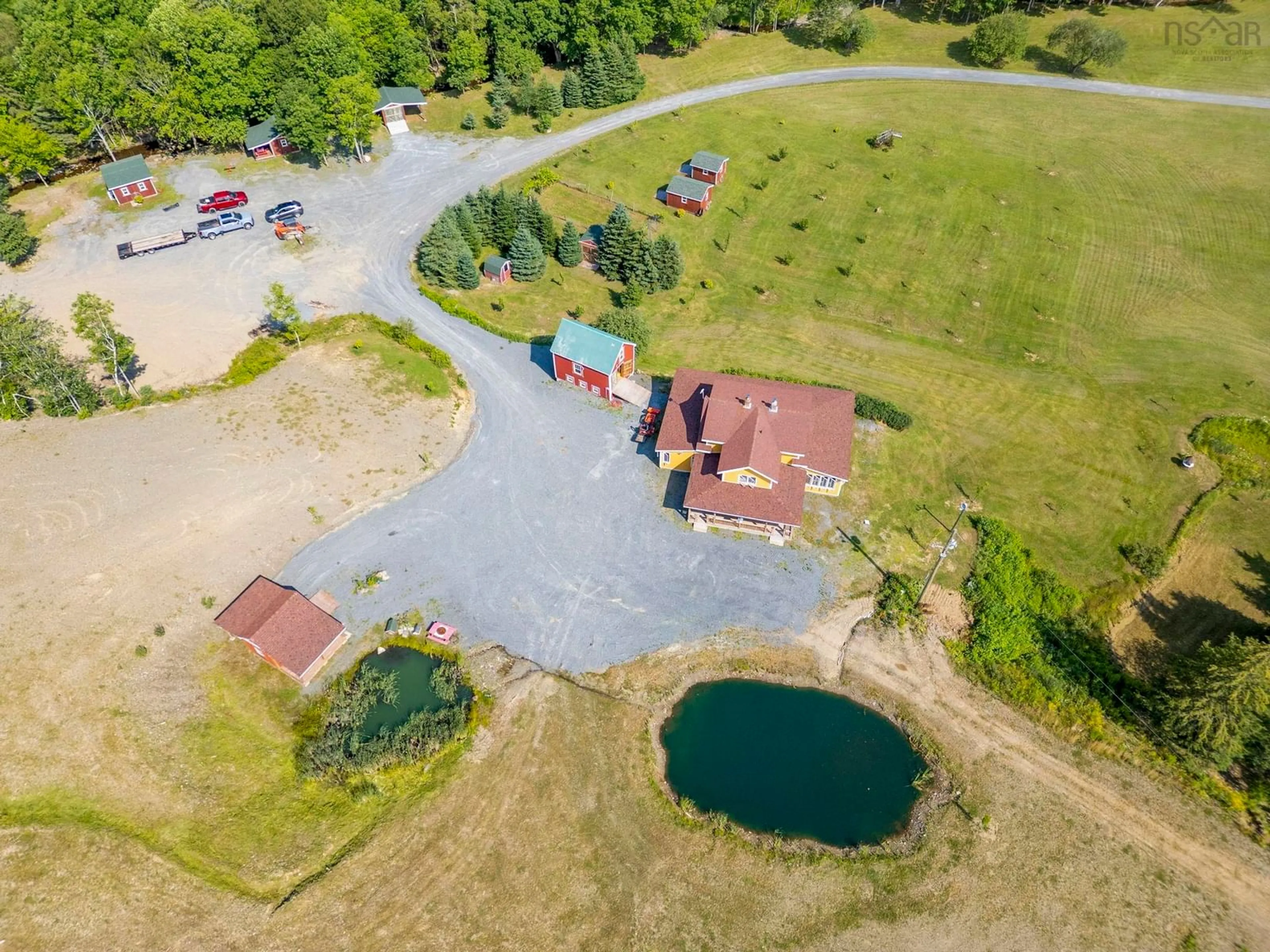 A pic from outside/outdoor area/front of a property/back of a property/a pic from drone, water/lake/river/ocean view for 1013 Fall Brook Rd, Mcphersons Mills Nova Scotia B2H 5C8