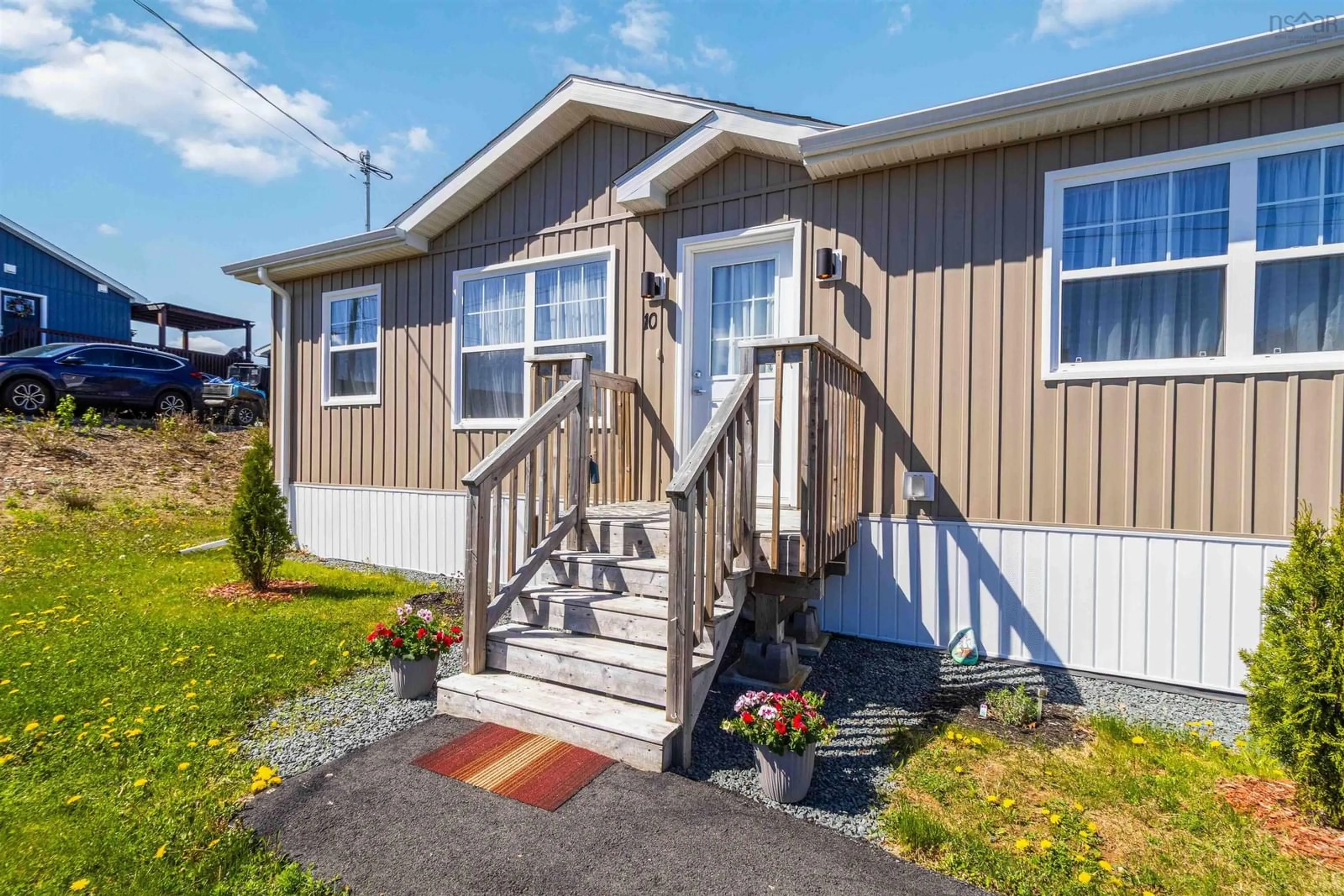 Home with vinyl exterior material, street for 10 Mossberry Close, Hubley Nova Scotia B3Z 0S9