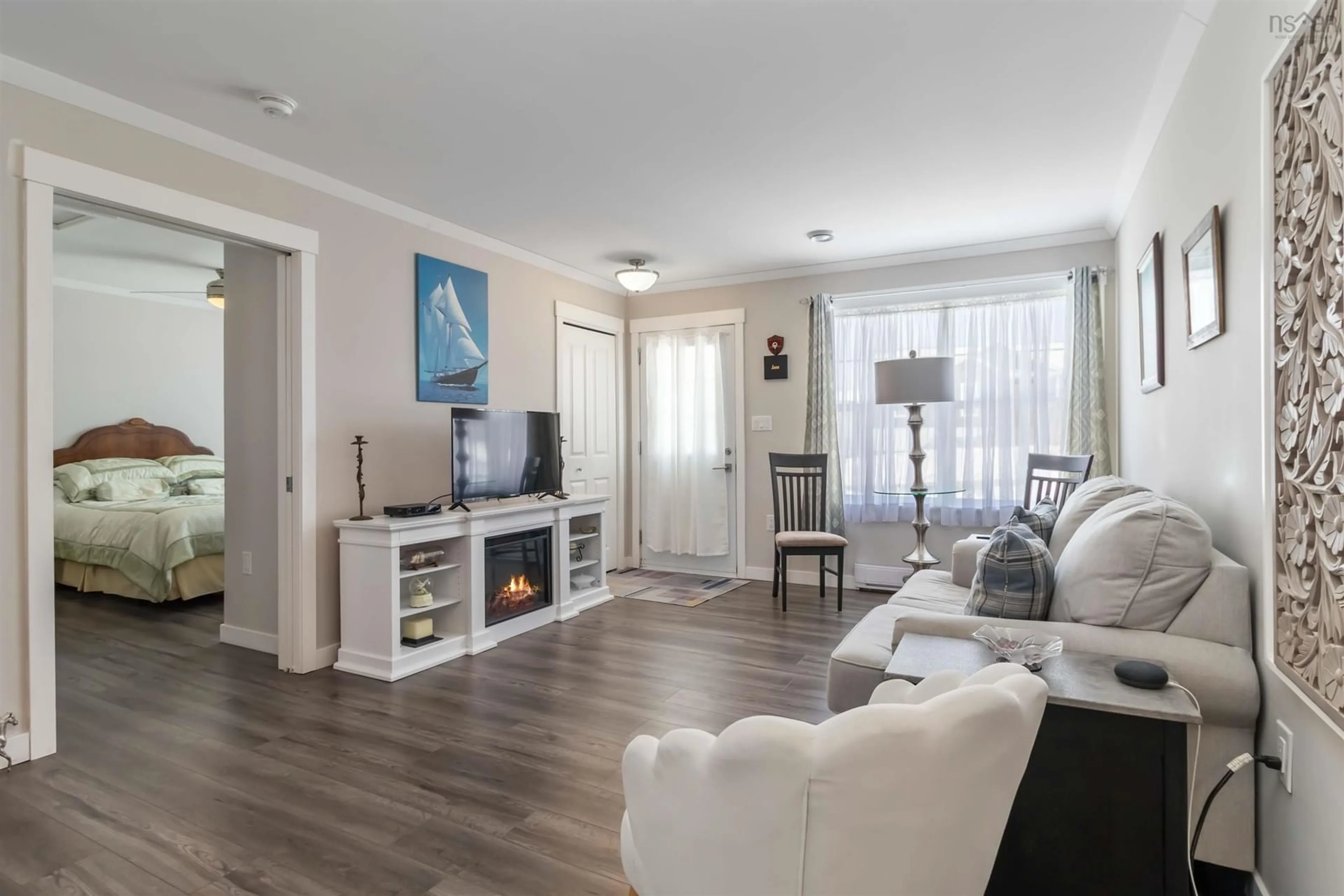 Living room with furniture, wood/laminate floor for 10 Mossberry Close, Hubley Nova Scotia B3Z 0S9