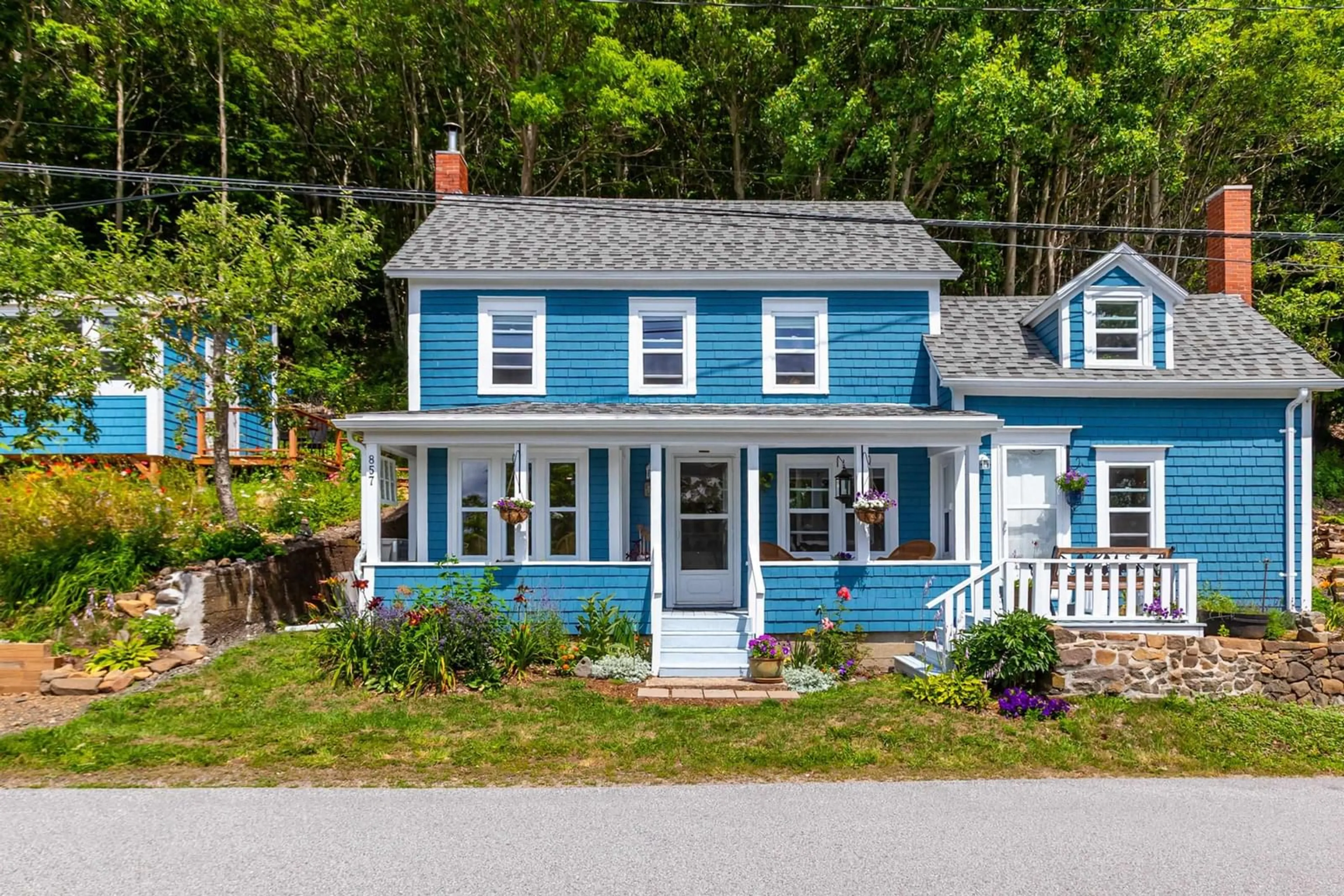 Home with vinyl exterior material, street for 857 Granville Rd, Victoria Beach Nova Scotia B0S 1A0