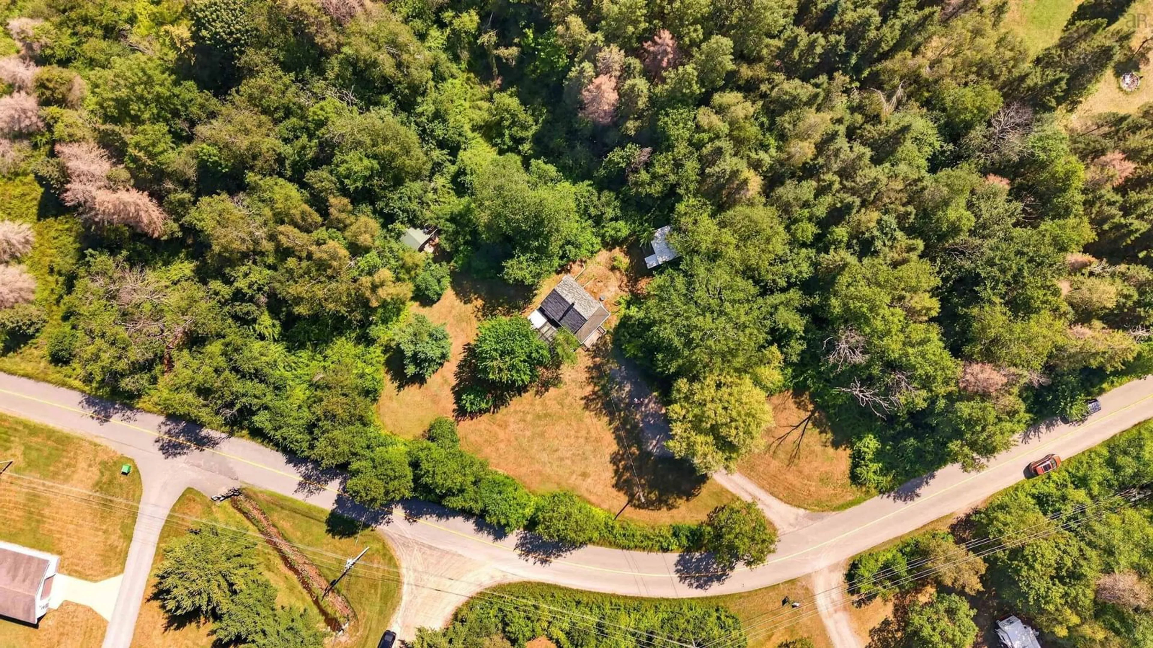 A pic from outside/outdoor area/front of a property/back of a property/a pic from drone, forest/trees view for 82 Cemetery Rd, Hants County Nova Scotia B0N 2E0