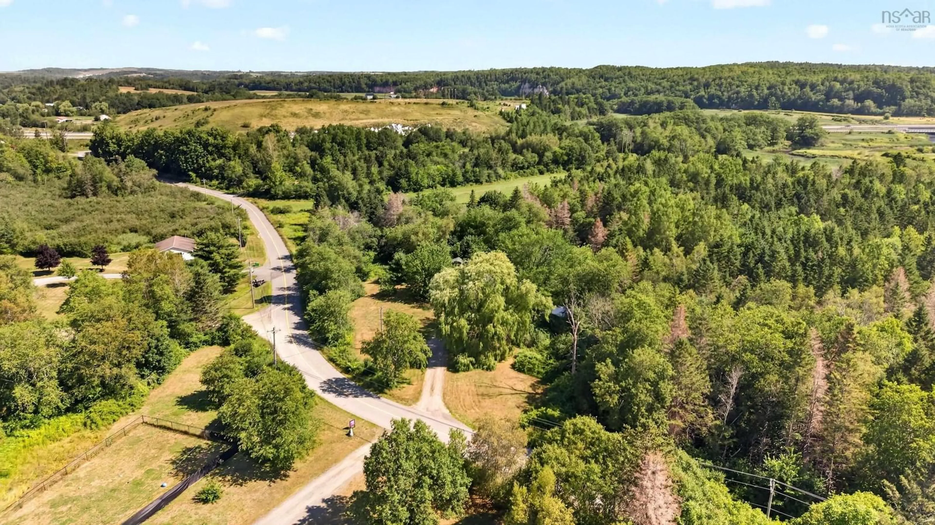 A pic from outside/outdoor area/front of a property/back of a property/a pic from drone, forest/trees view for 82 Cemetery Rd, Hants County Nova Scotia B0N 2E0