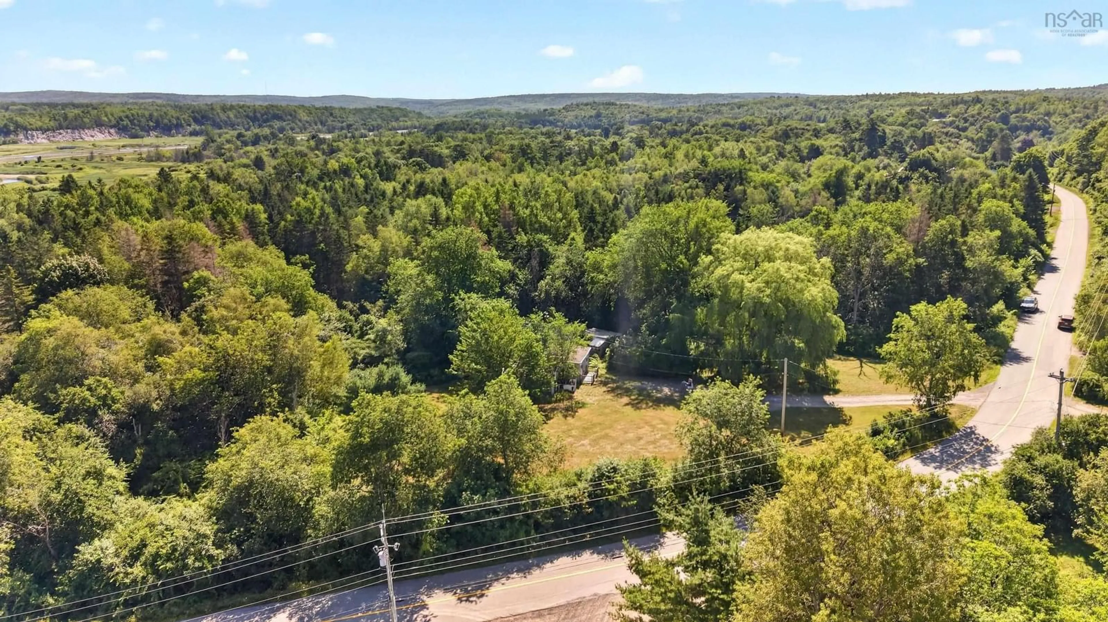 A pic from outside/outdoor area/front of a property/back of a property/a pic from drone, forest/trees view for 82 Cemetery Rd, Hants County Nova Scotia B0N 2E0