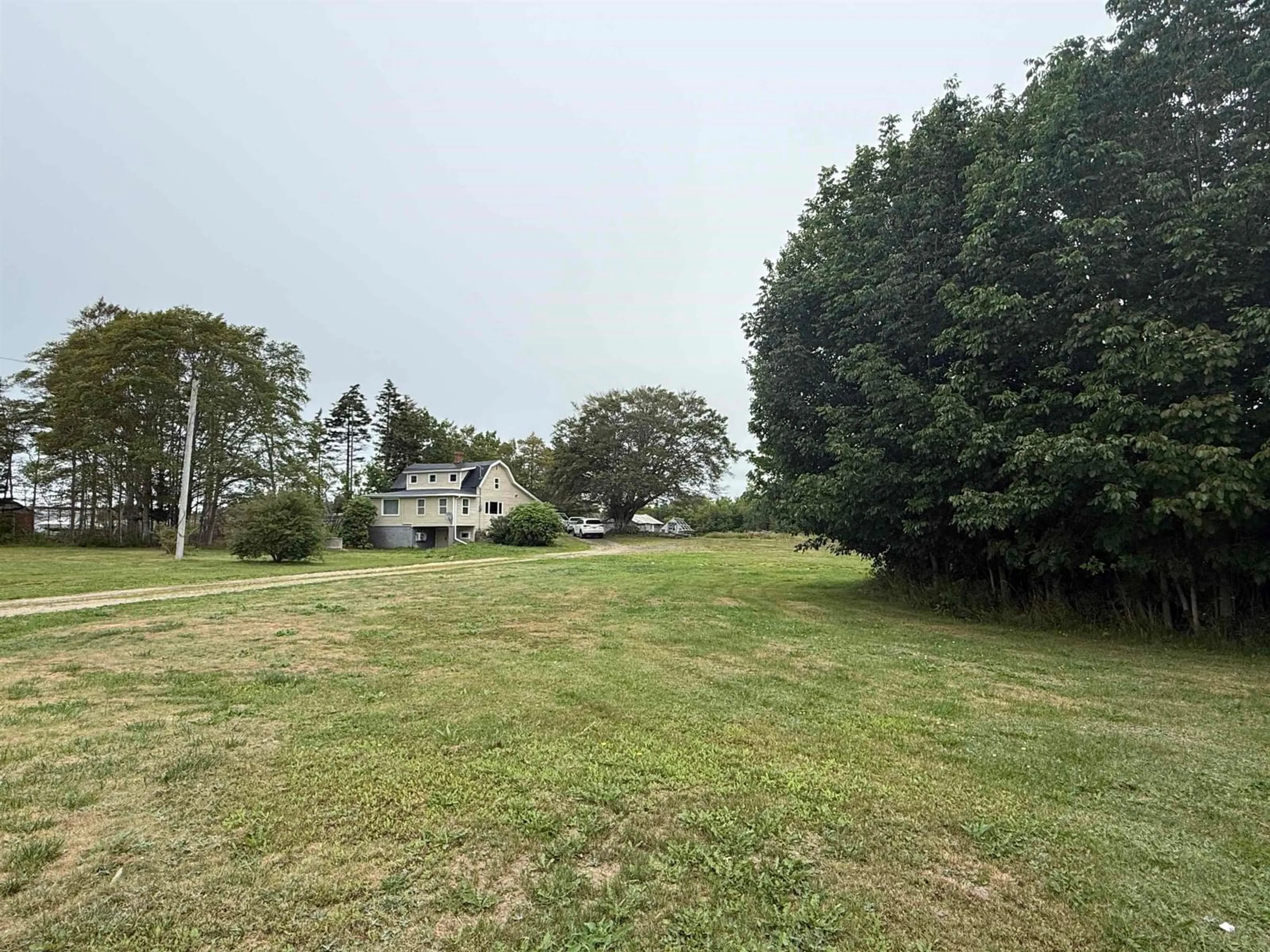 A pic from outside/outdoor area/front of a property/back of a property/a pic from drone, unknown for 345 French Rd, Plympton Nova Scotia B0W 2R0
