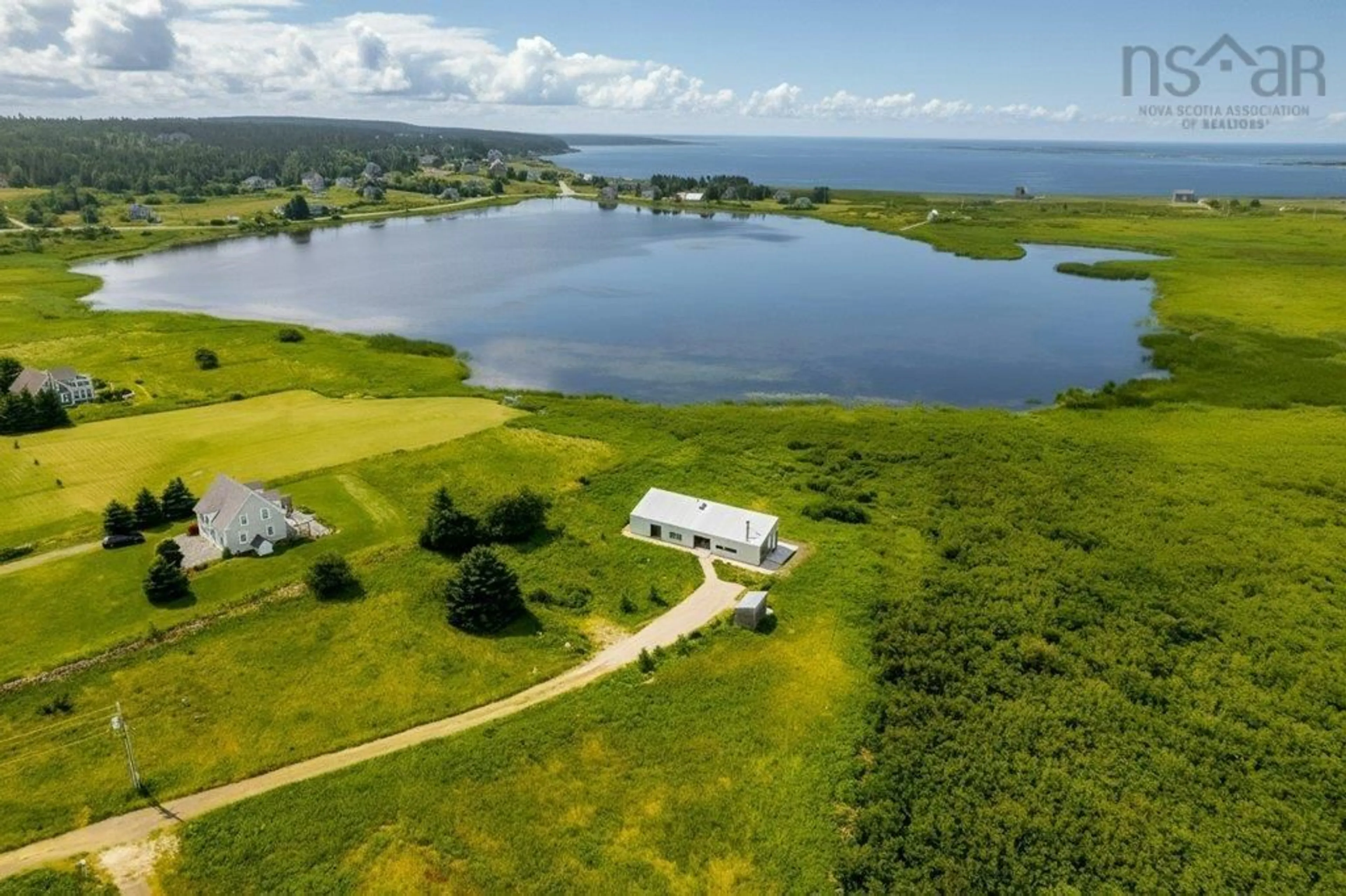 A pic from outside/outdoor area/front of a property/back of a property/a pic from drone, water/lake/river/ocean view for 81 Hirtle Beach Rd, Kingsburg Nova Scotia B0J 2X0