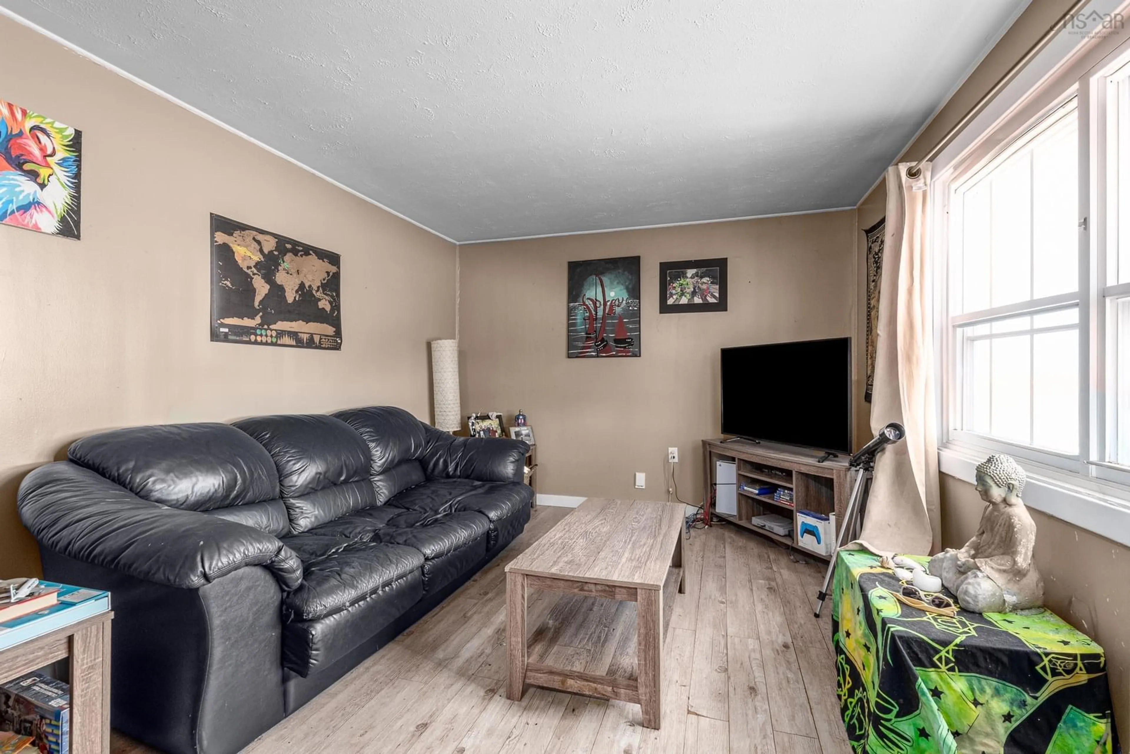 Living room with furniture, wood/laminate floor for 116 Coronation Ave, Halifax Nova Scotia B3N 2N1