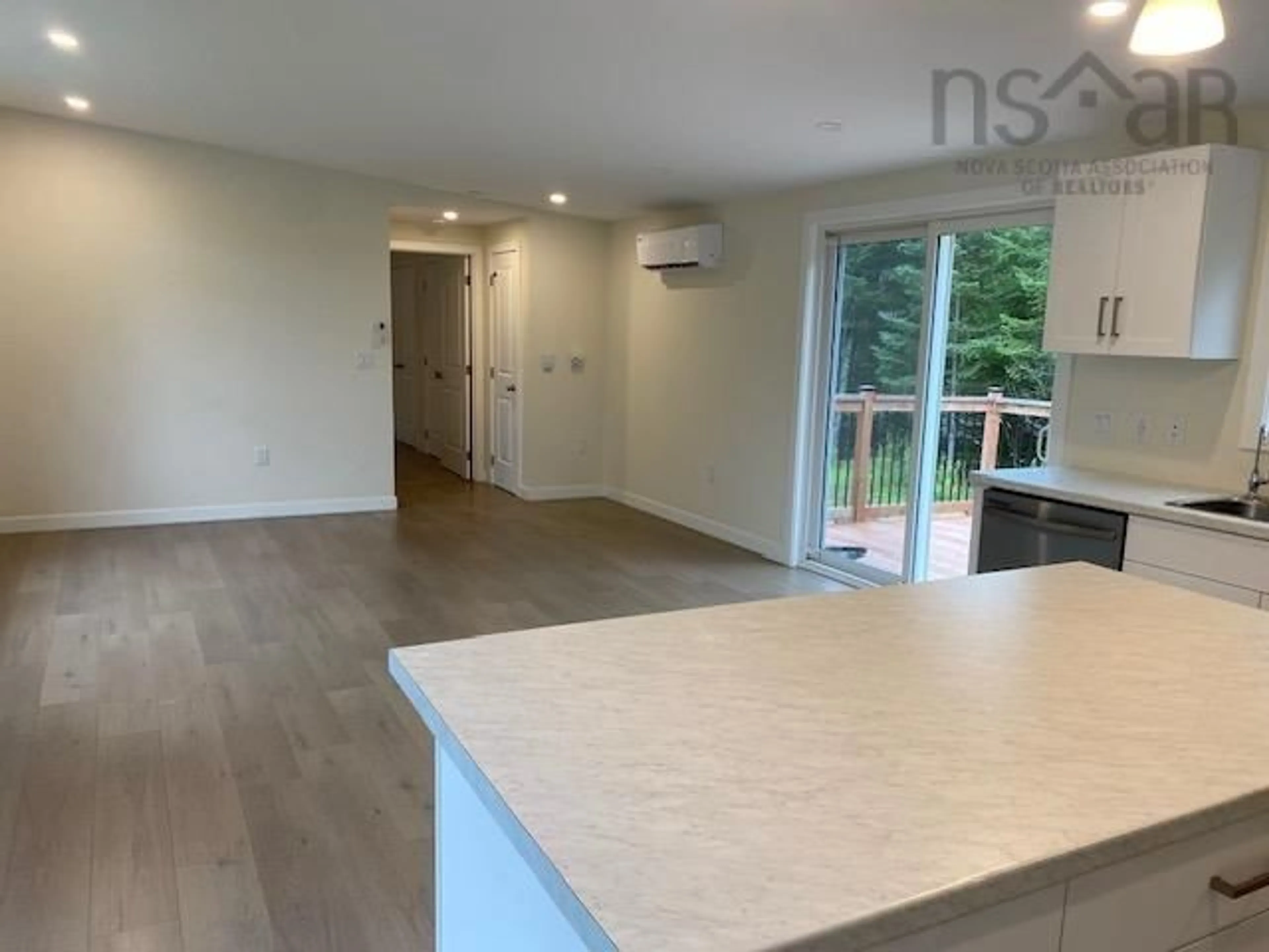 Open concept kitchen, wood/laminate floor for 1134 Lake Egmont Rd, Lake Egmont Nova Scotia B0N 1Y0