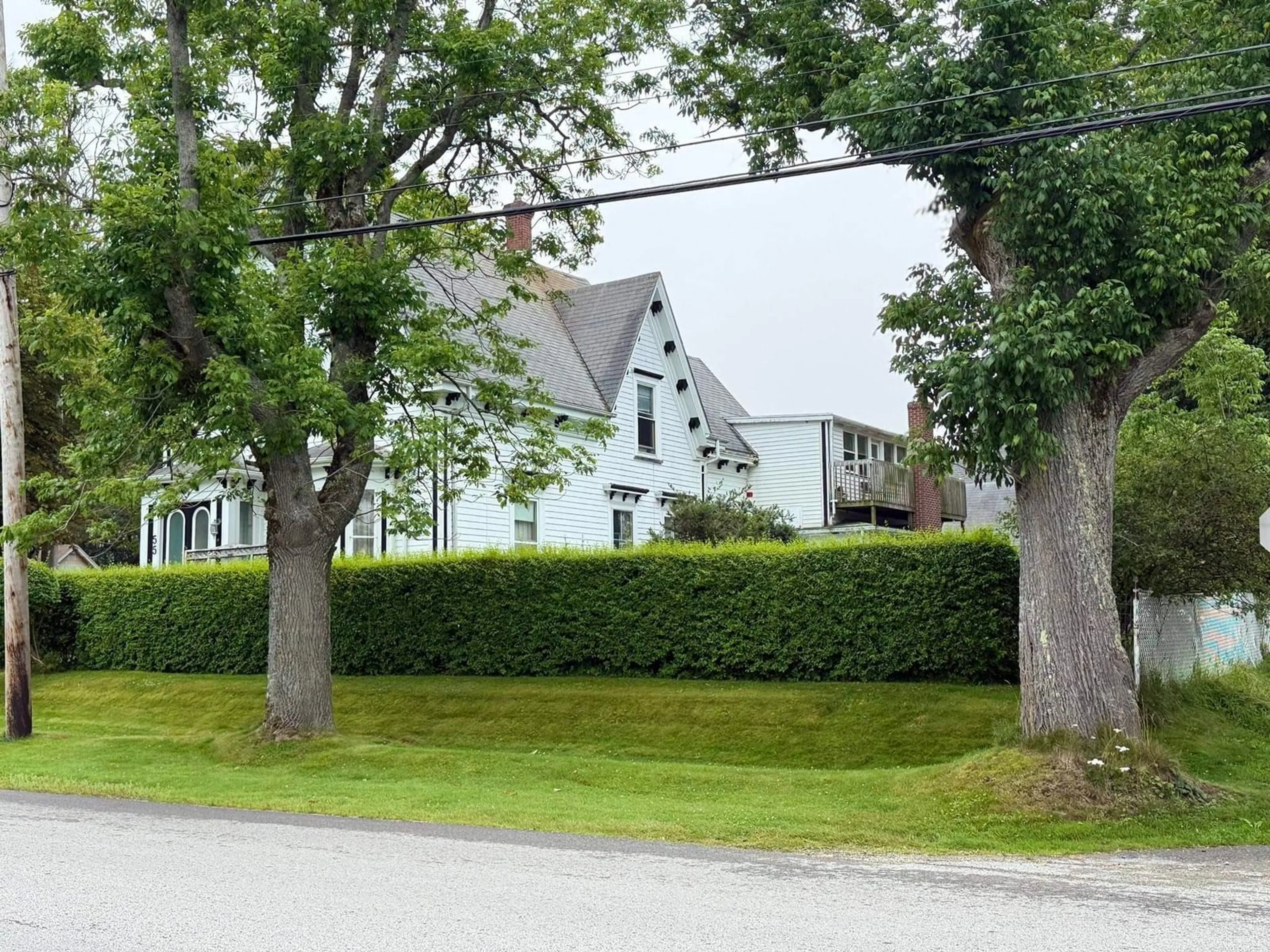 A pic from outside/outdoor area/front of a property/back of a property/a pic from drone, street for 55 Forest St, Yarmouth Nova Scotia B5A 3L7