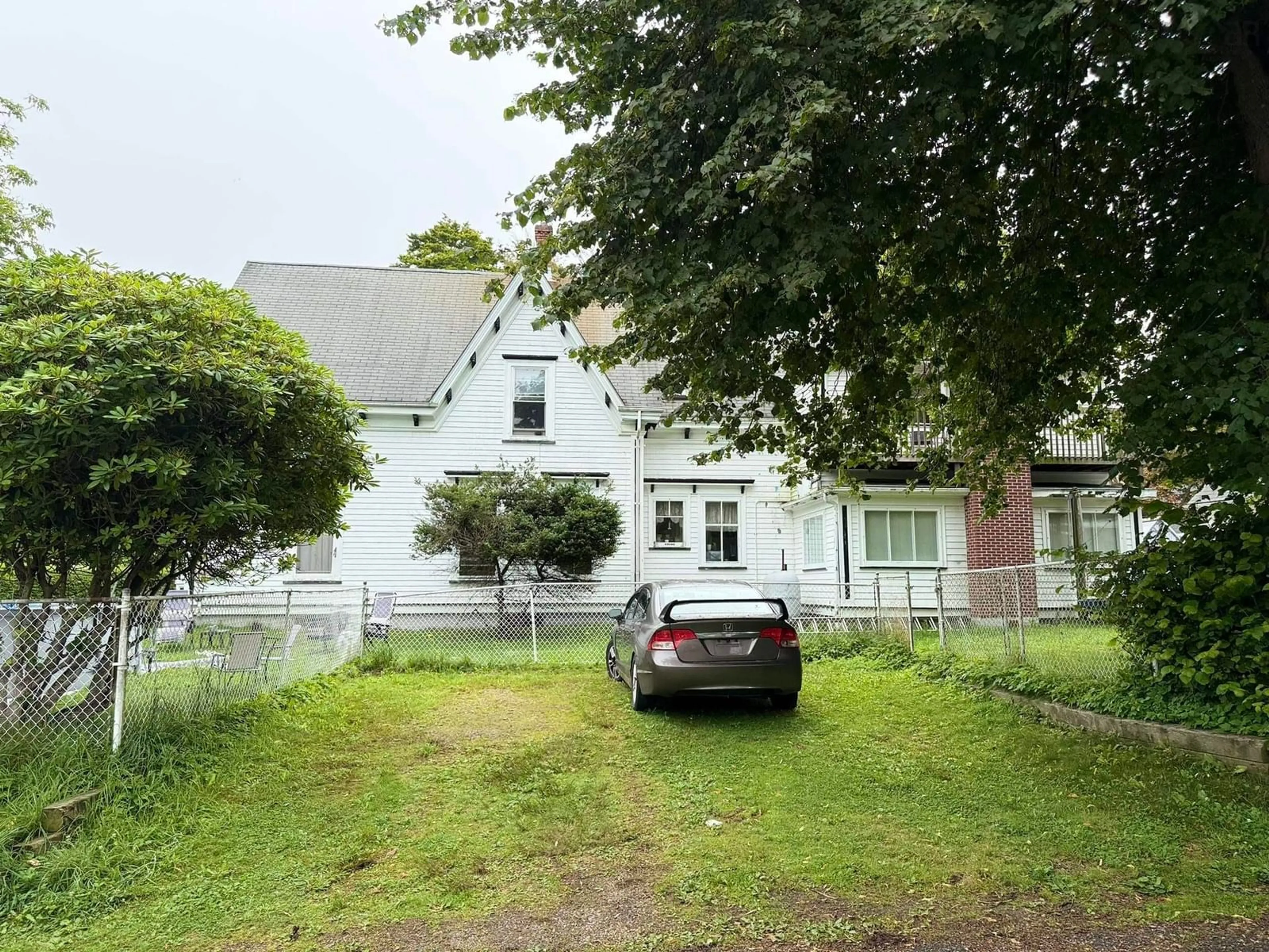 A pic from outside/outdoor area/front of a property/back of a property/a pic from drone, street for 55 Forest St, Yarmouth Nova Scotia B5A 3L7